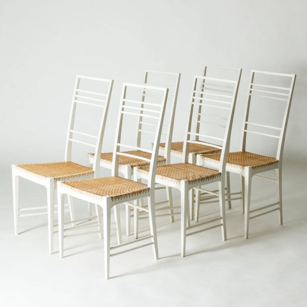 Set of six “Poem” dining chairs by Erik Chambert