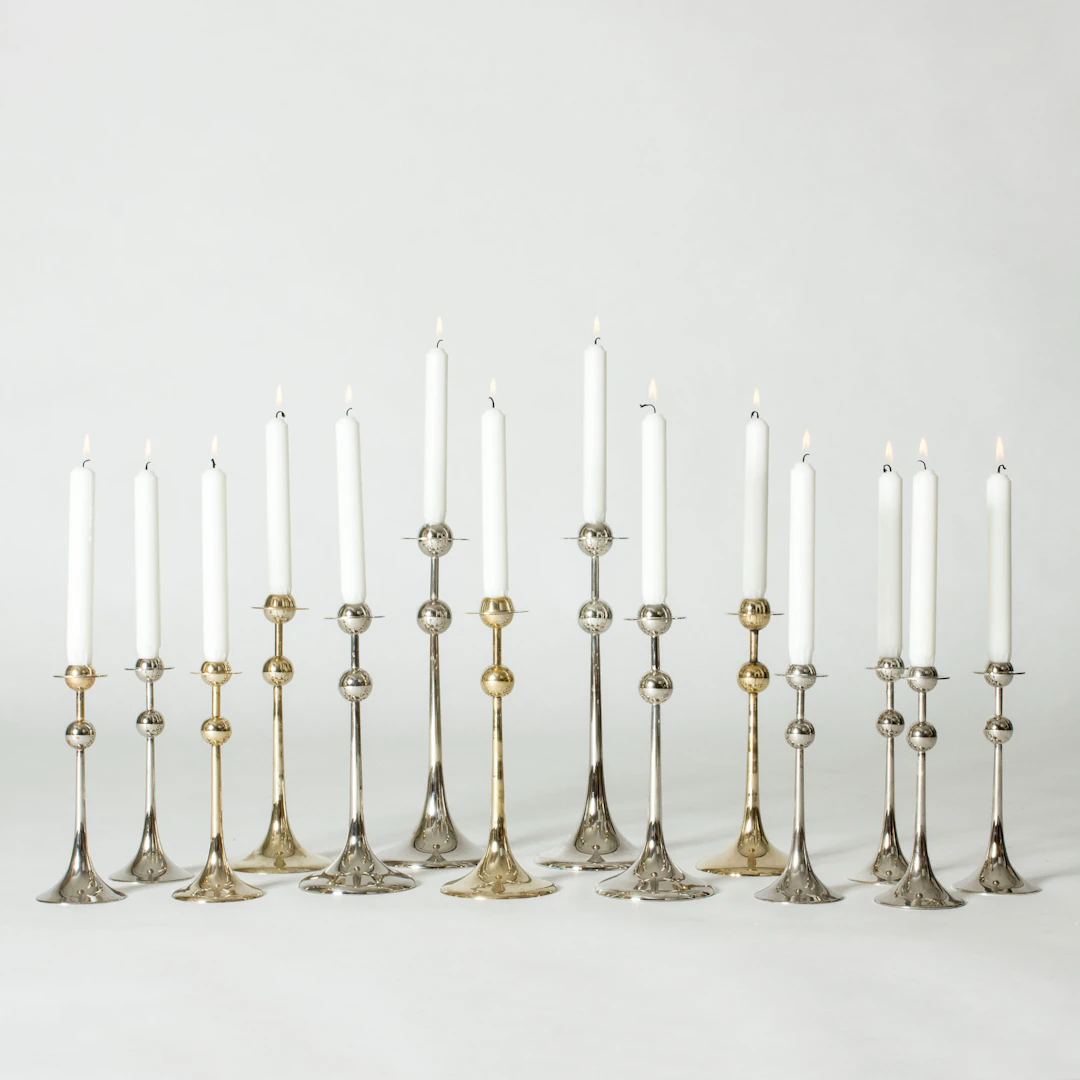 Set of 14 “Saturnus” candlesticks by Kjell Engman