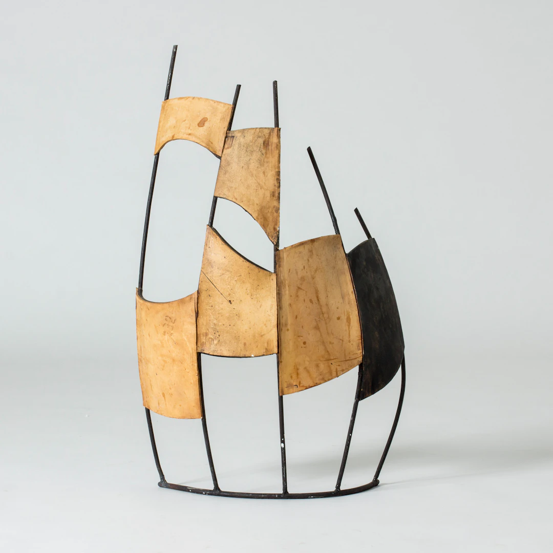Leather and metal sculpture by Fred Leyman