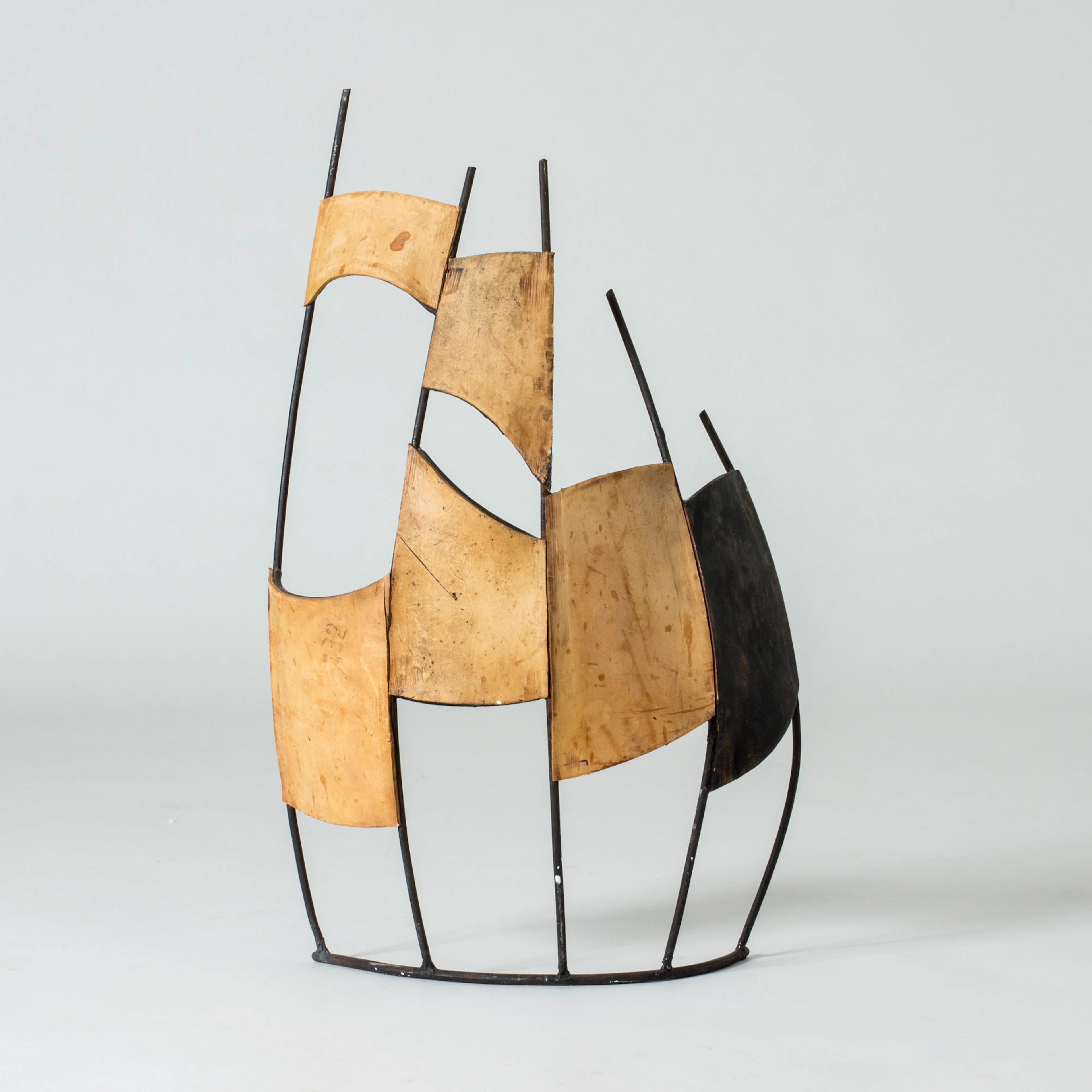 Leather and metal sculpture by Fred Leyman
