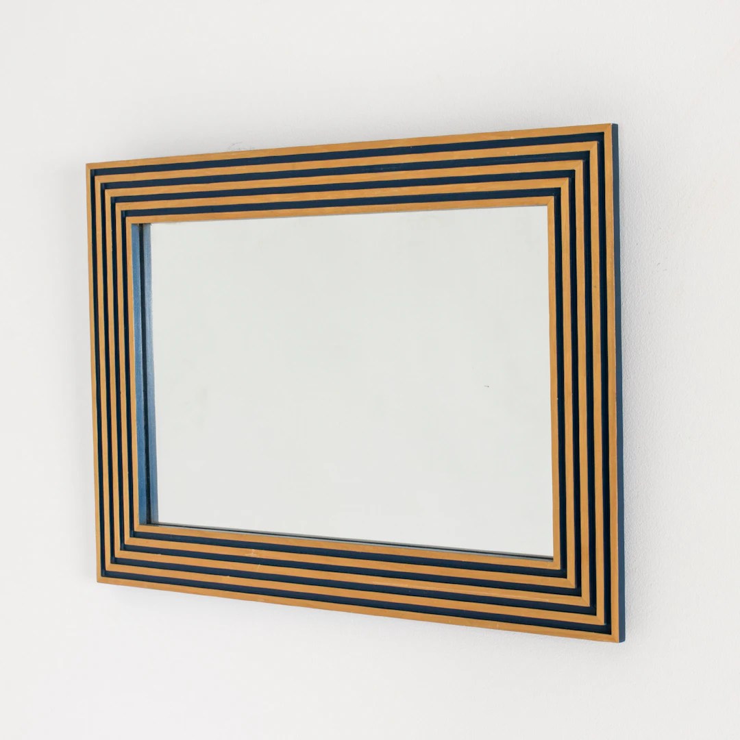 Wall mirror by Susanne Tucker and Maurice Holland