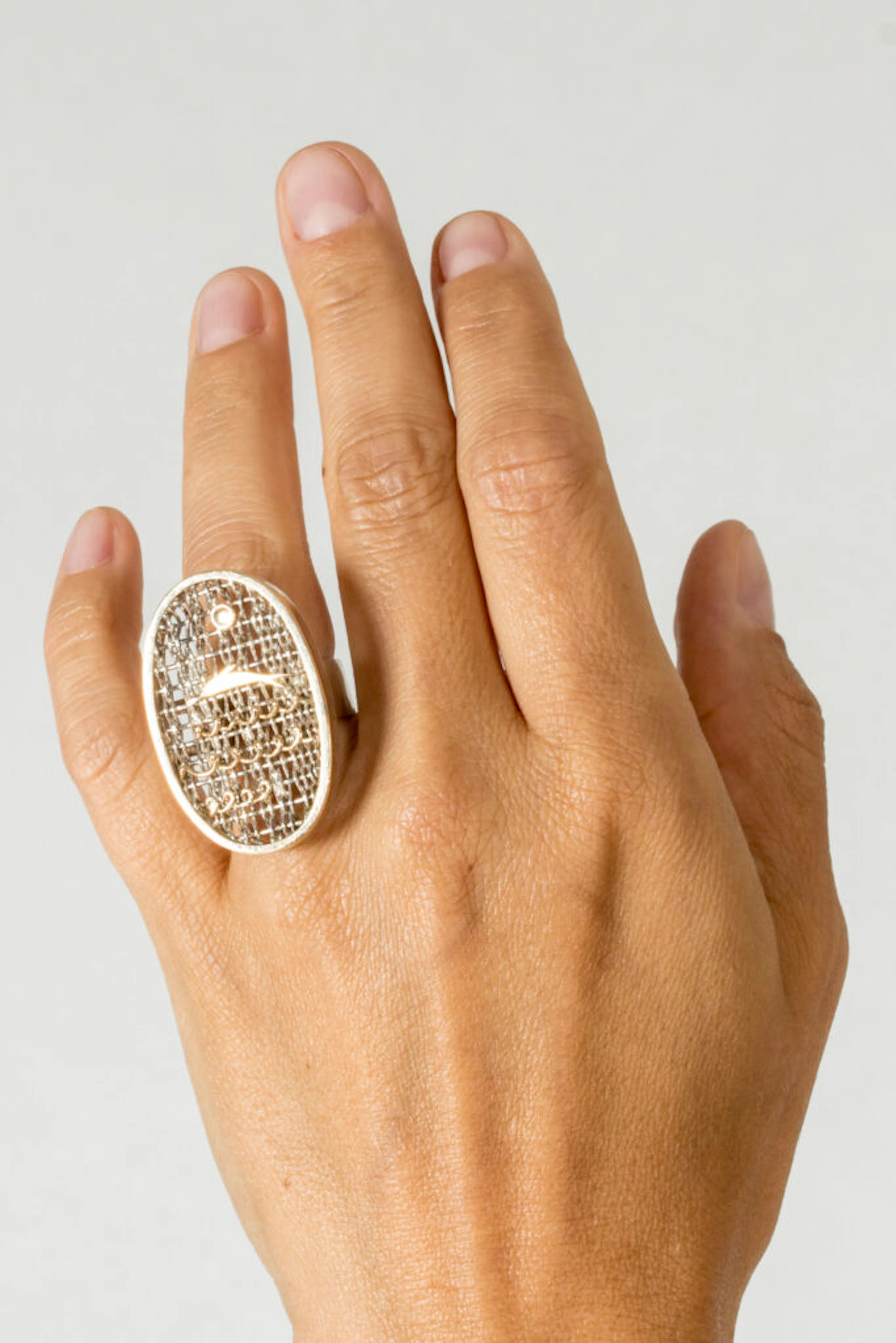 Midcentury silver ring with gold details by Anders Högberg