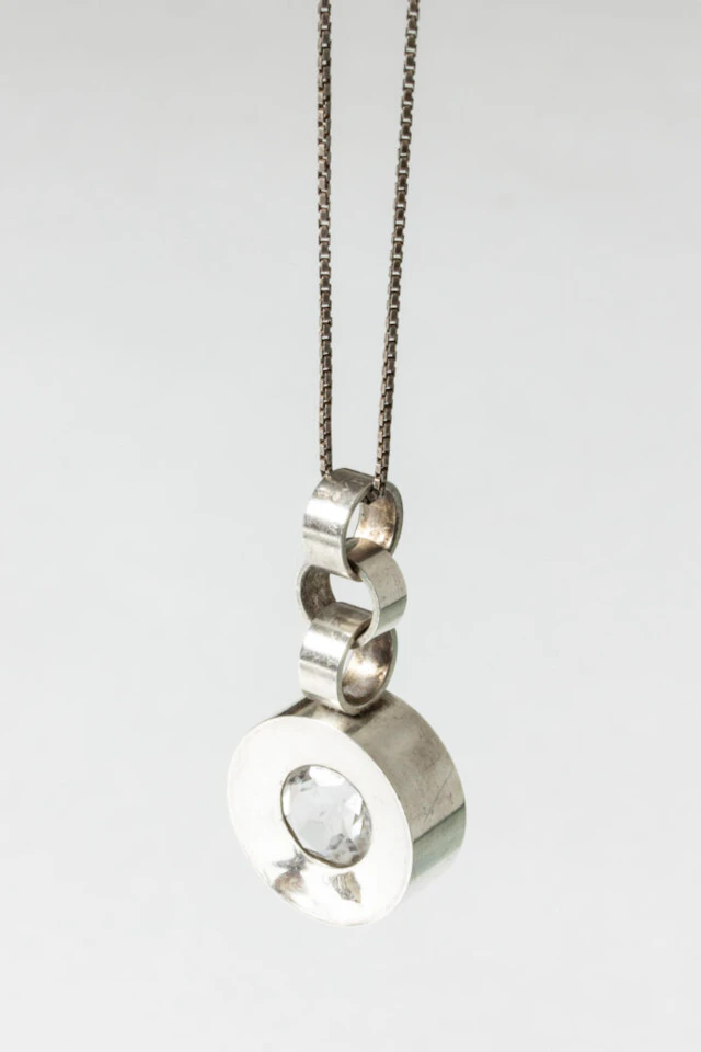 Silver and rock crystal pendant by Elis Kauppi