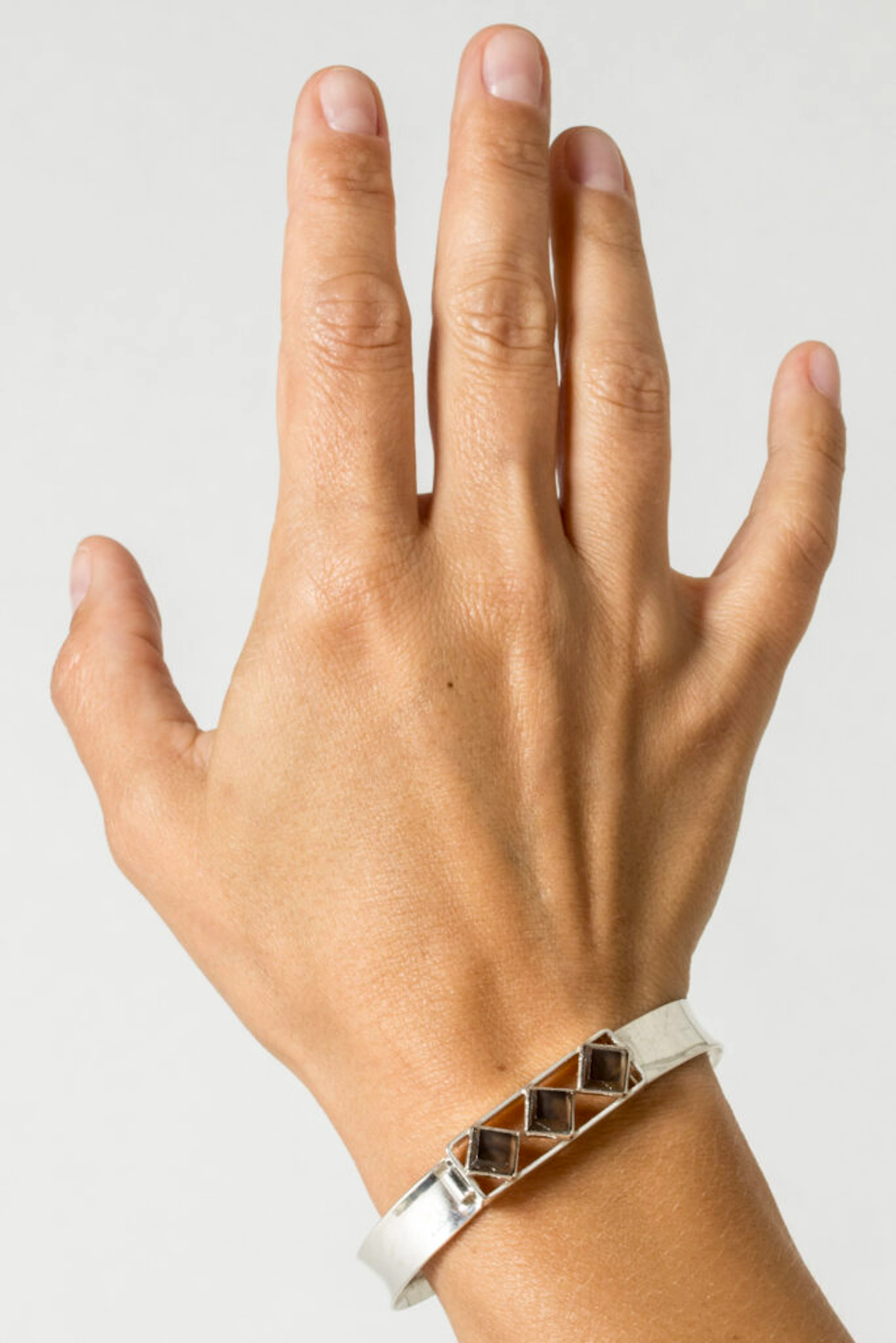 Modernist silver and smoke quartz bracelet by Olavi Piira
