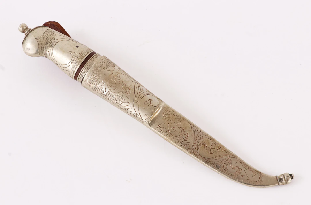Kniv med slida, 1900-talets första hälft