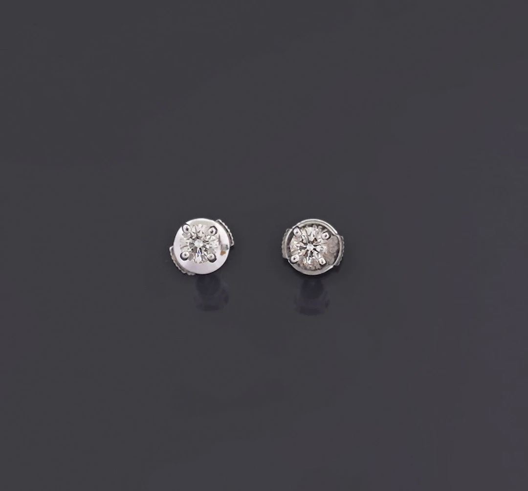 Pair of 18k white gold (750) stud earrings, each set with a - Lot 237