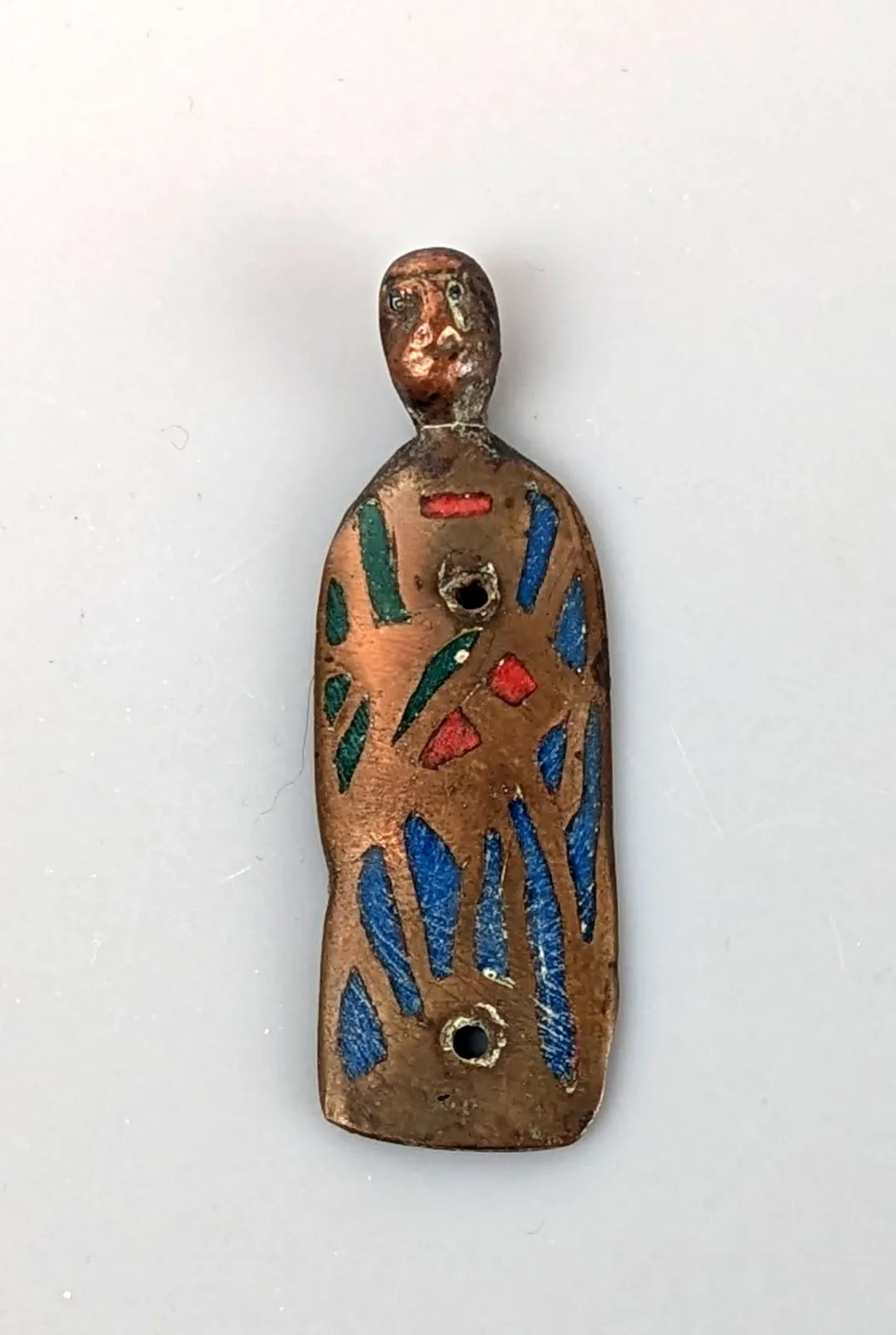 Shrine doll decorated with blue, green and red enamels in bo - Lot 213
