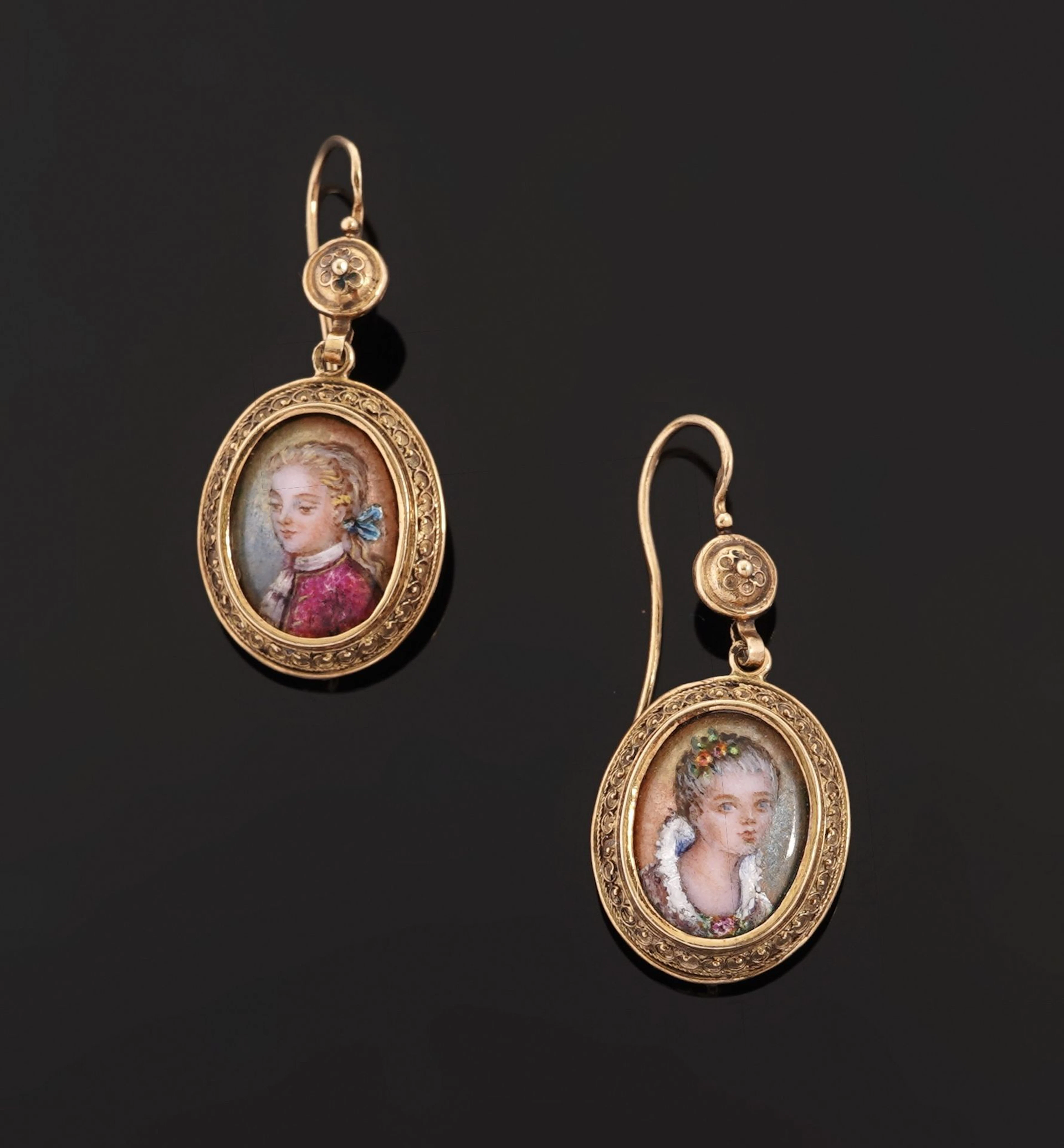 A pair of 18k yellow gold (750) earrings featuring an oval e - Lot 128