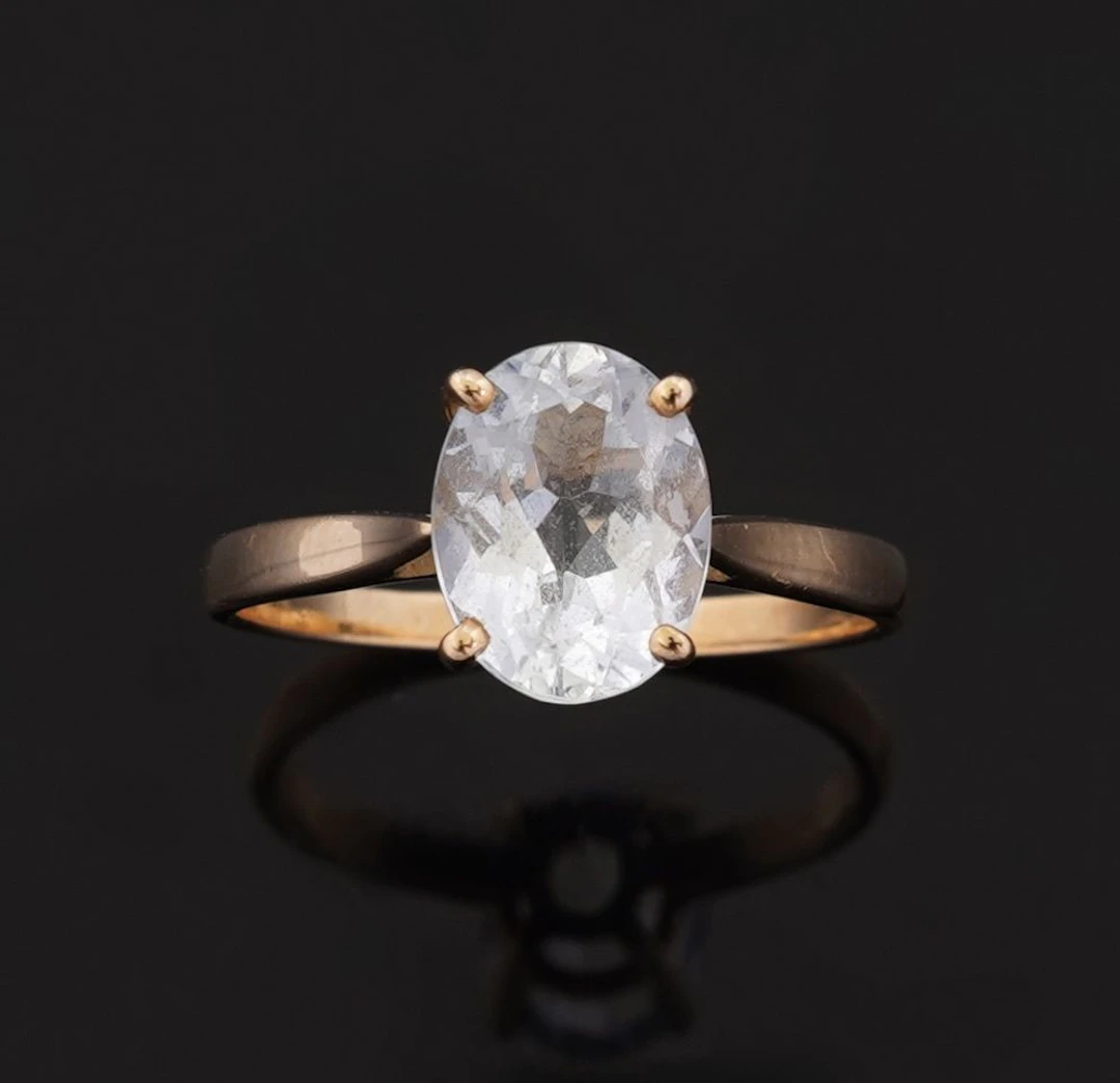 18k yellow gold ring (750 parts per thousand) set with a pal - Lot 187