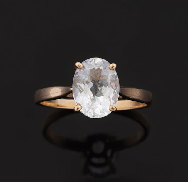 18k yellow gold ring (750 parts per thousand) set with a pal - Lot 187