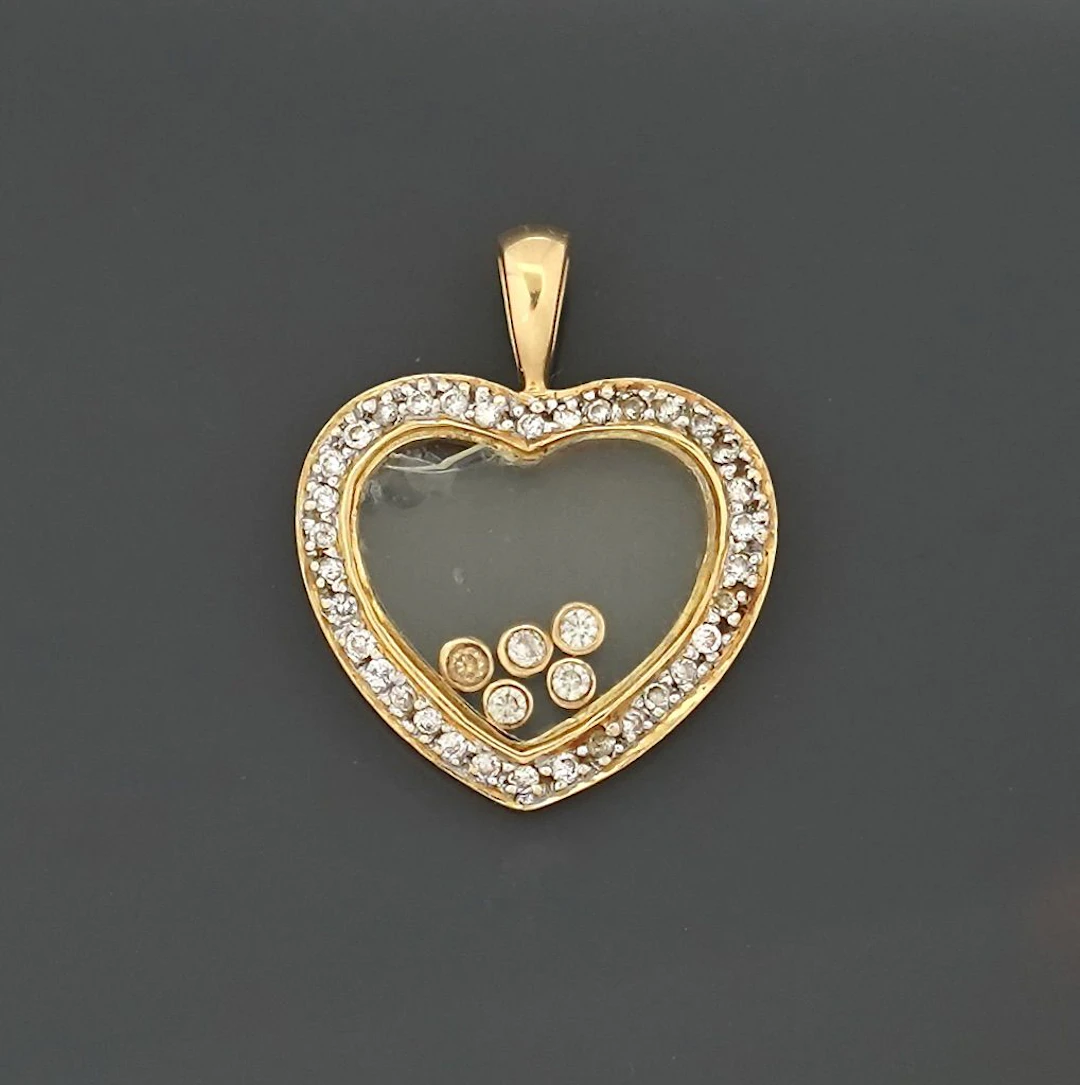 18k yellow gold (750) heart-shaped pendant set with modern-c - Lot 273
