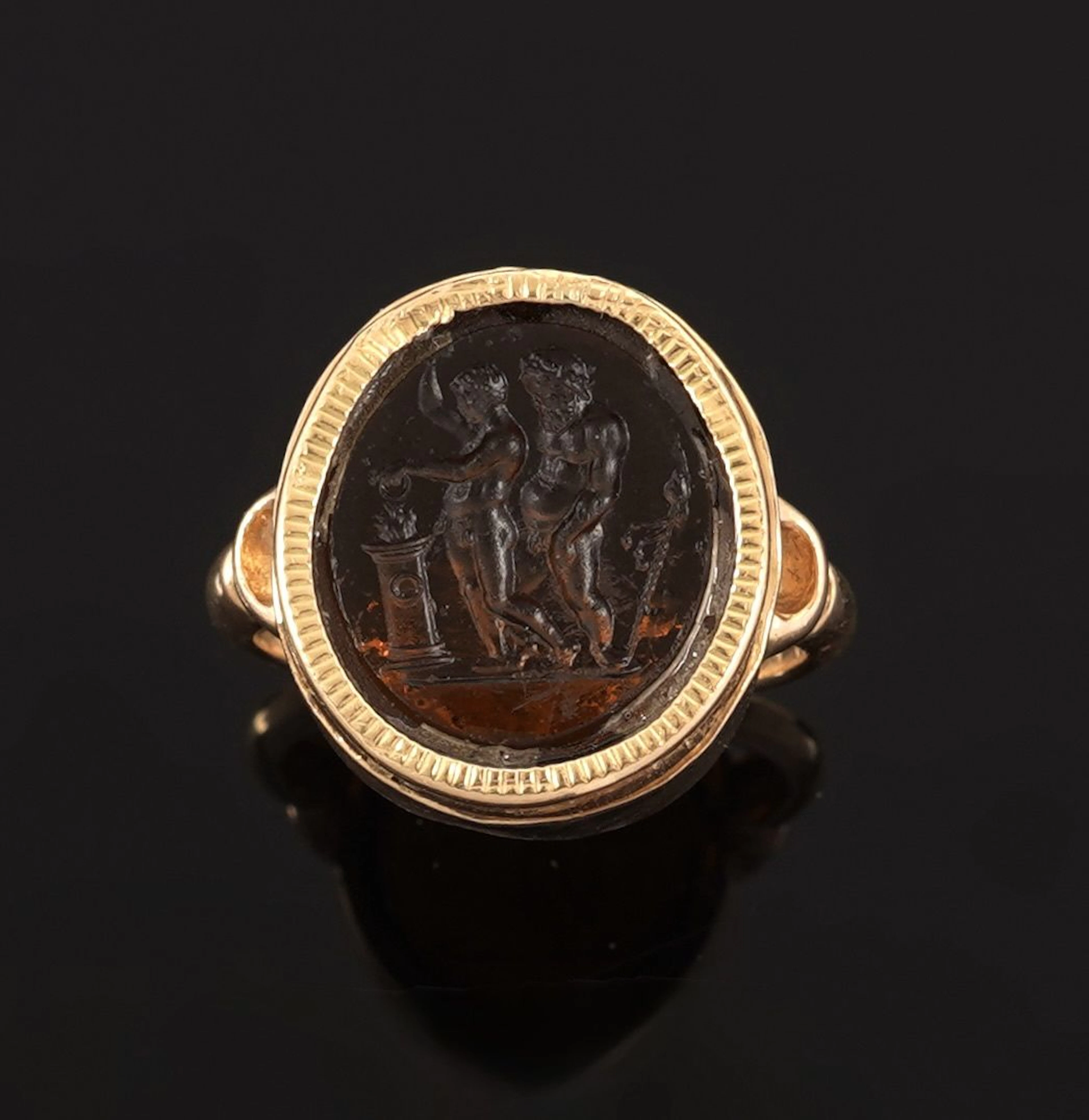 18k yellow gold ring (750 parts per thousand) set with a bro - Lot 147