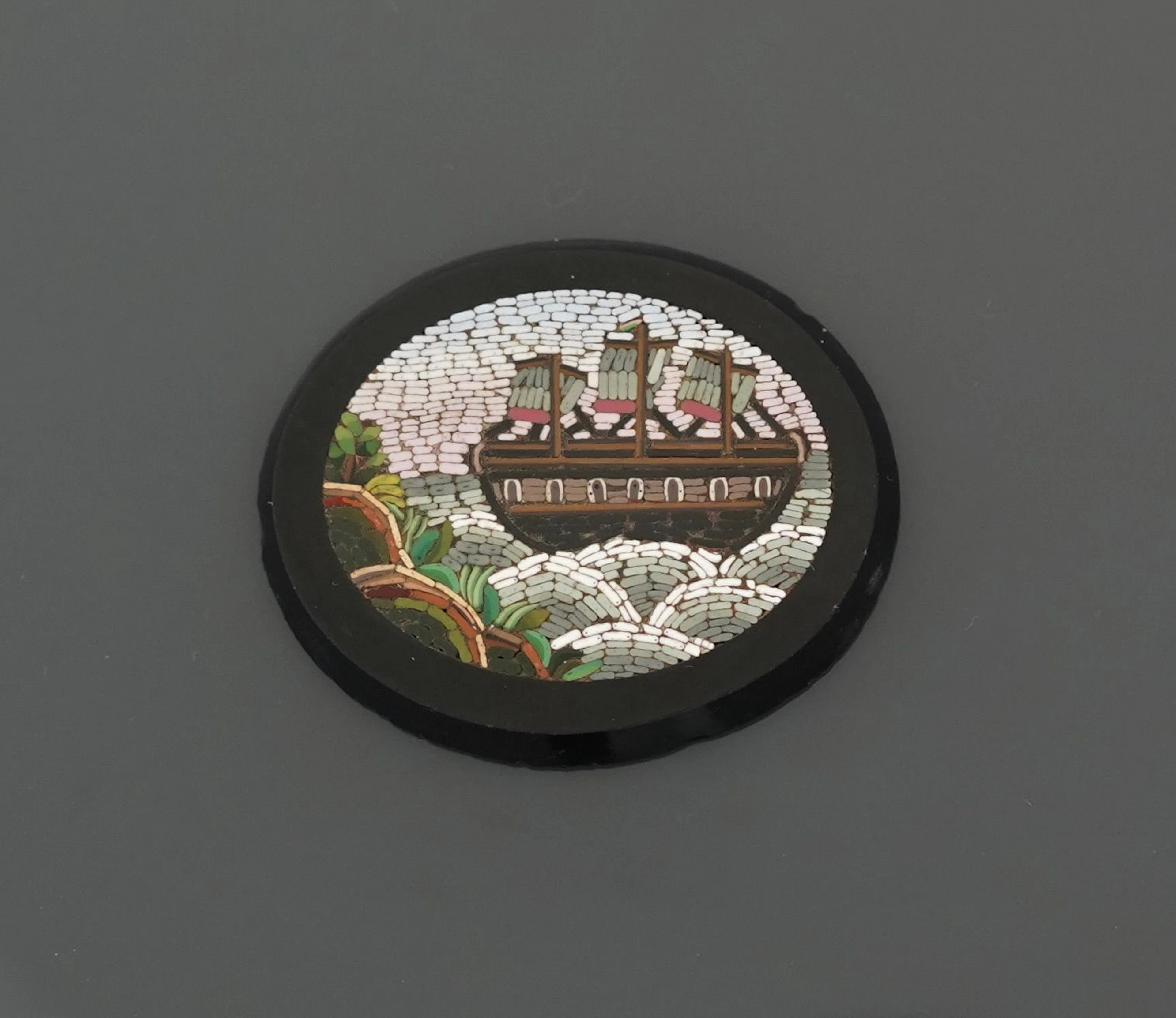 Oval plaque with a micromosaic design depicting a seascape w - Lot 146
