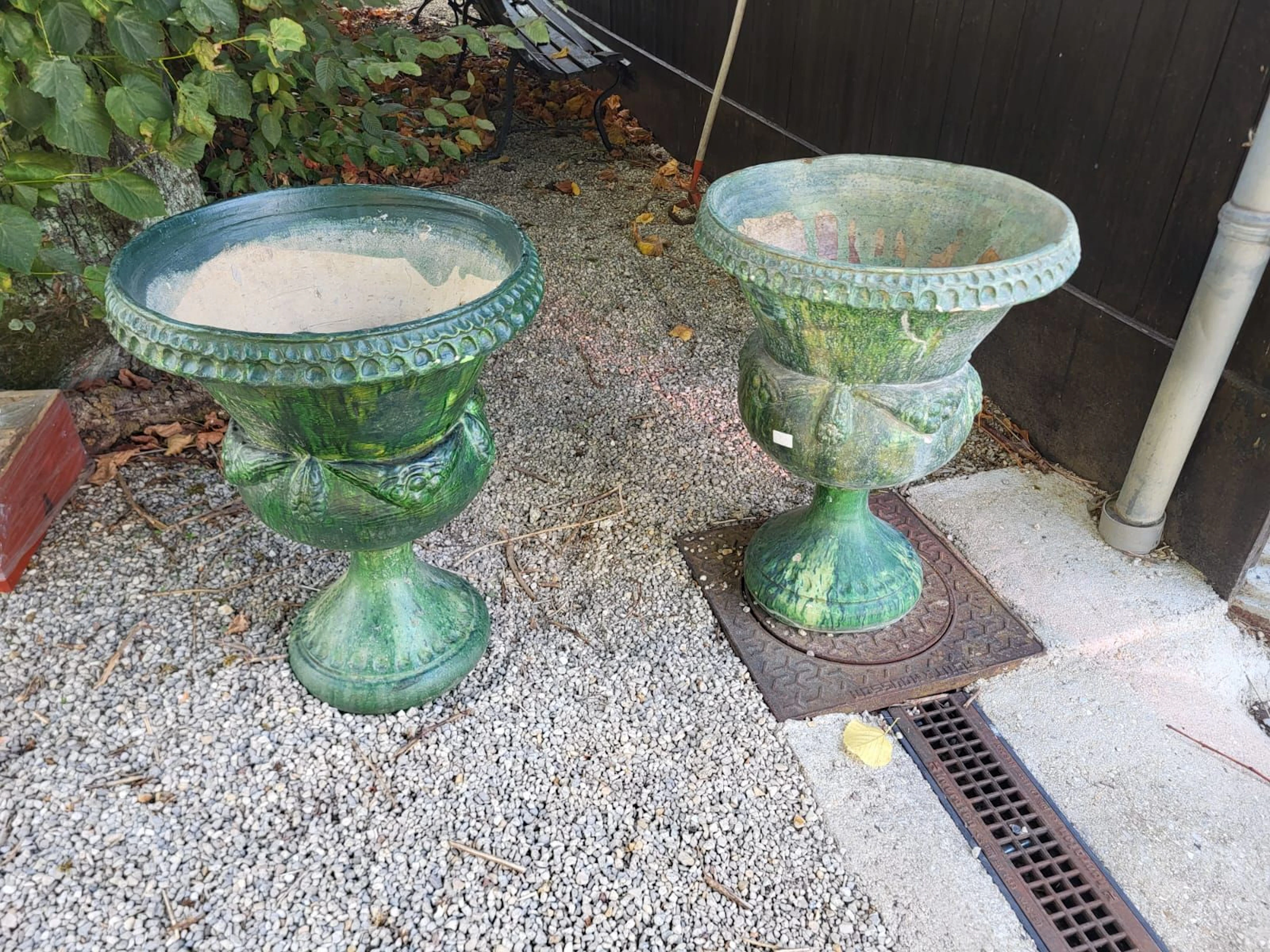 Pair of large ceramic planters with a green, mottled glaze. - Lot 511