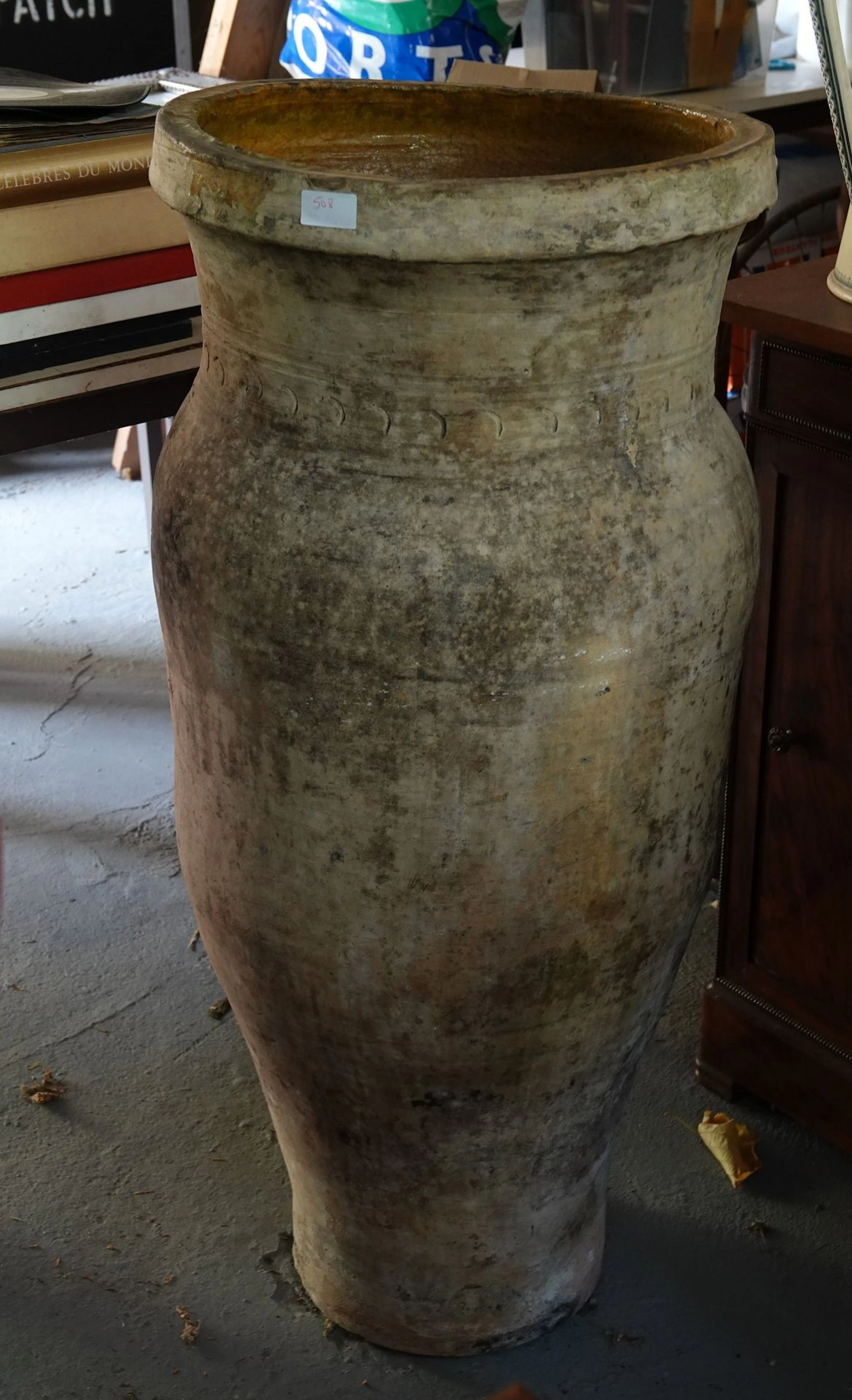 Large terracotta planter with a weathered finish and recesse - Lot 577
