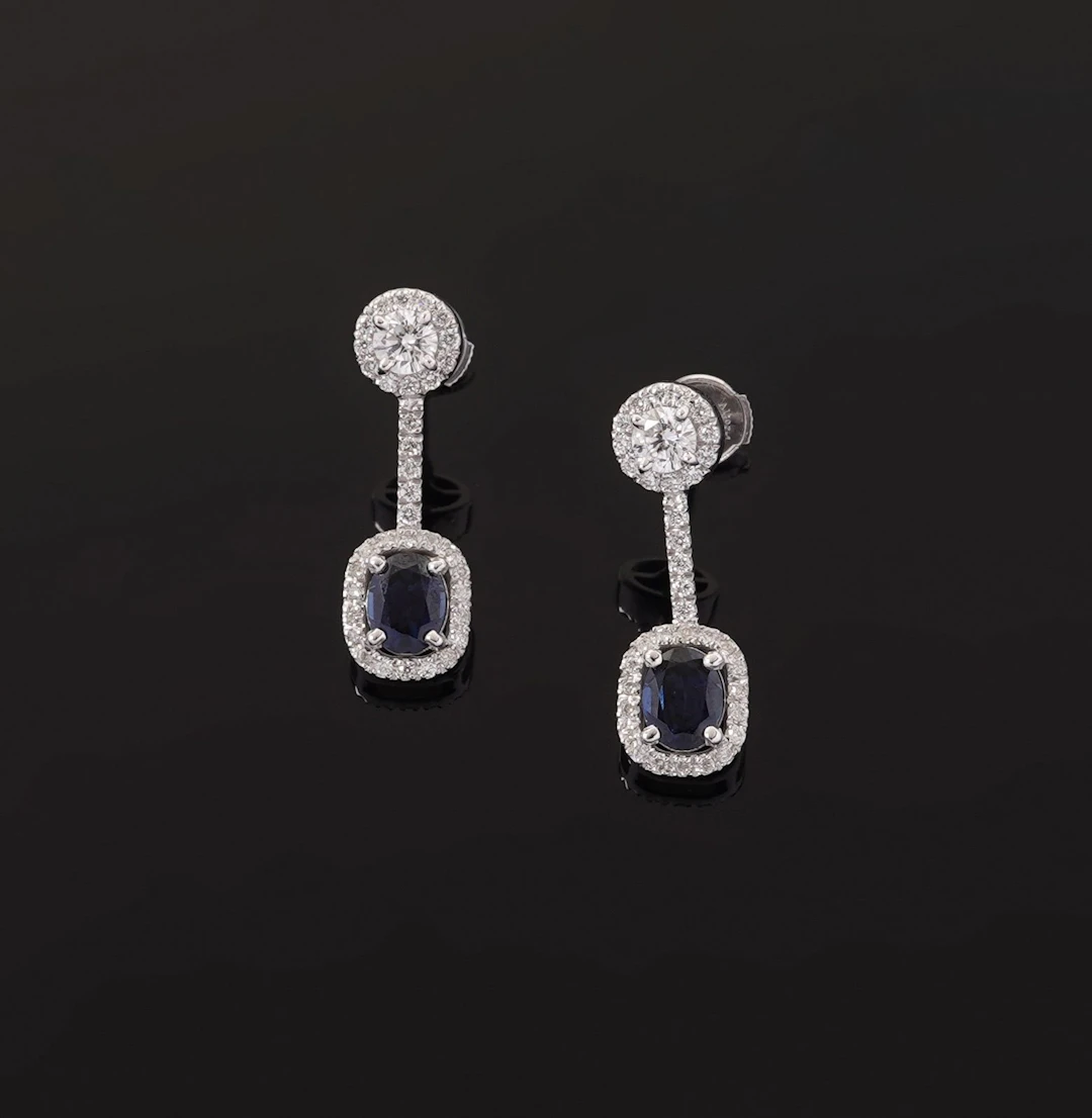A pair of 18k white gold (750) earrings, each featuring a br - Lot 322