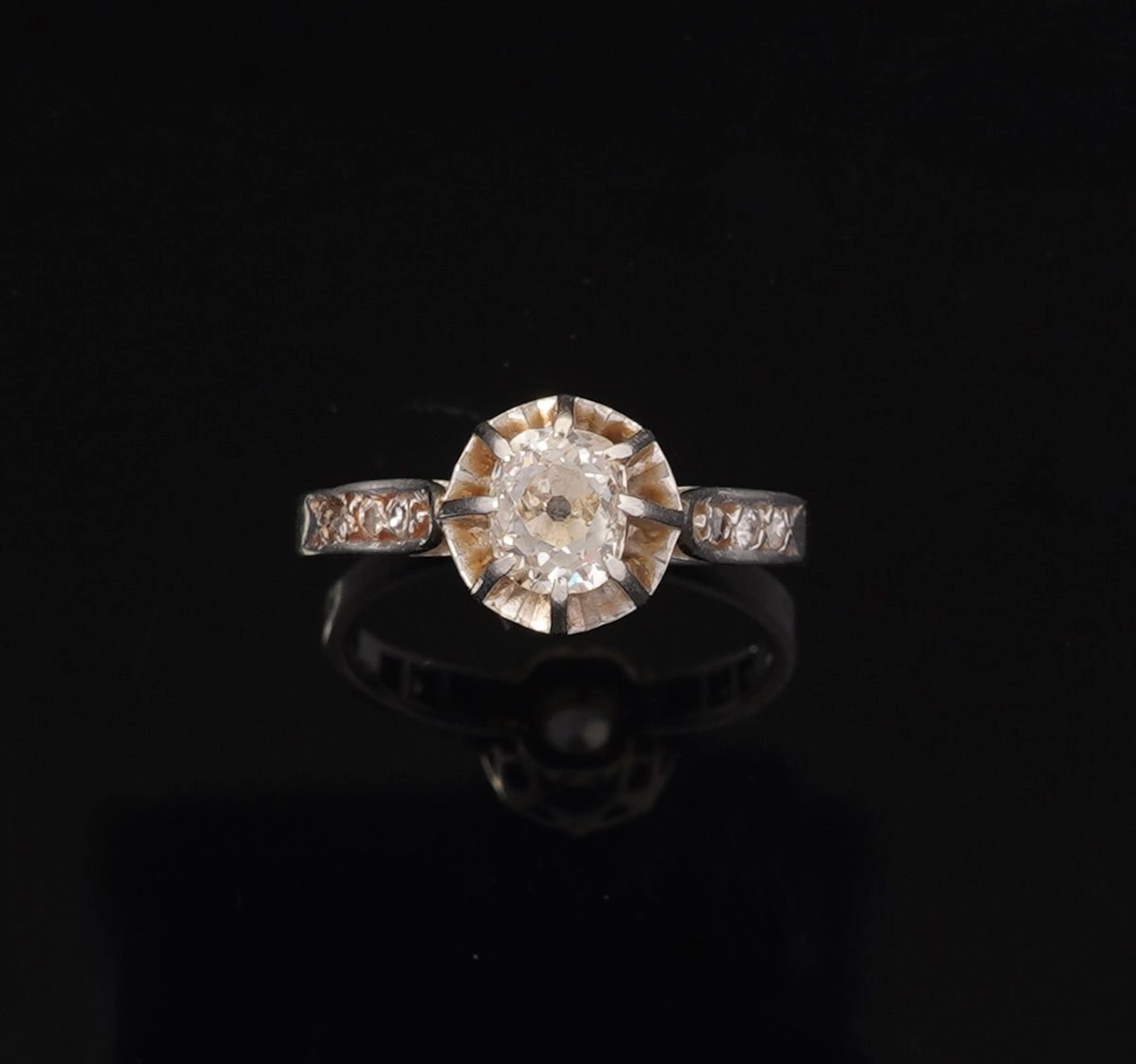 An 18k white gold solitaire ring (750 parts per thousand) se - Lot 274