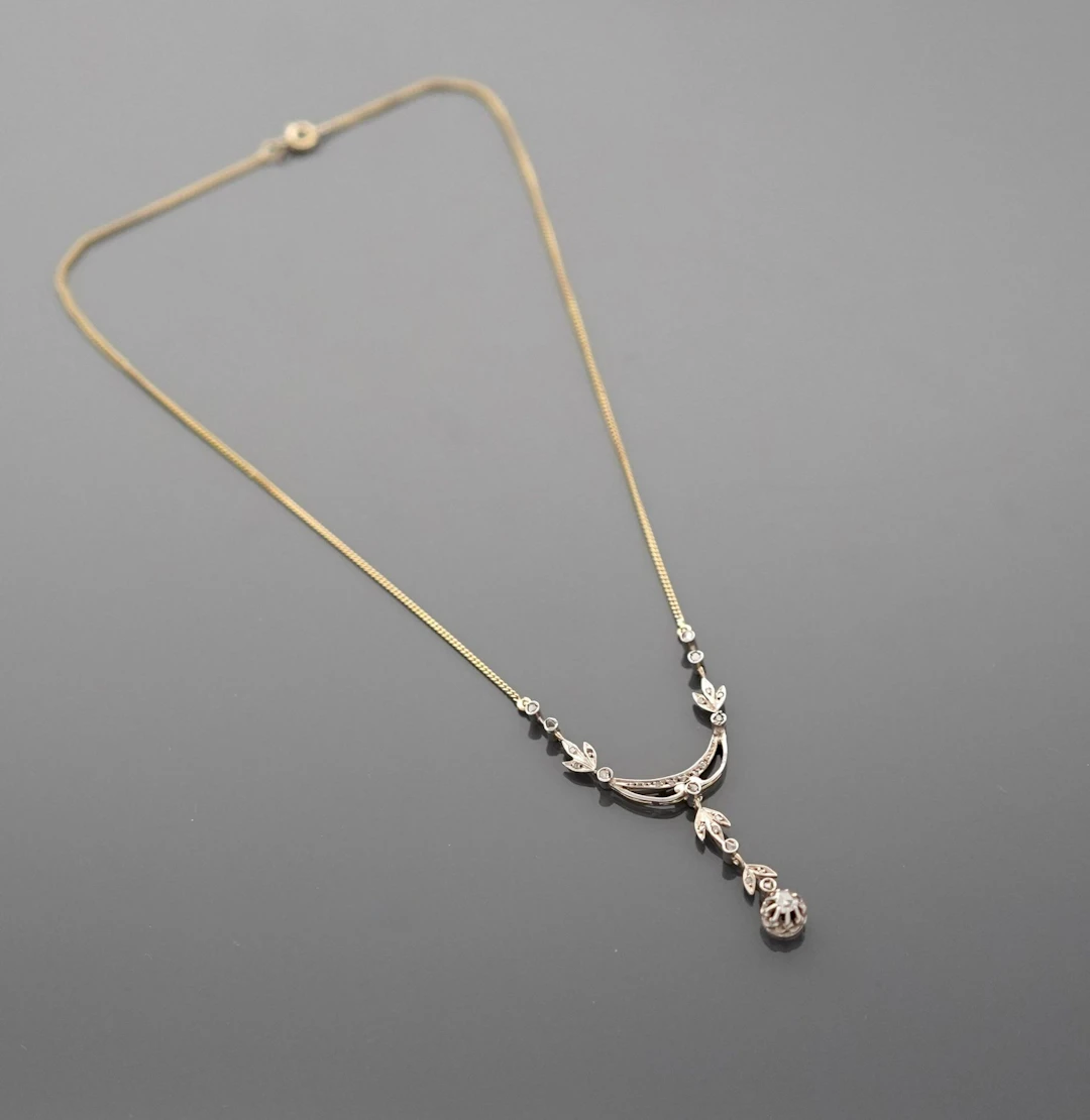 18K yellow gold (750 parts per thousand) and sterling silver - Lot 254
