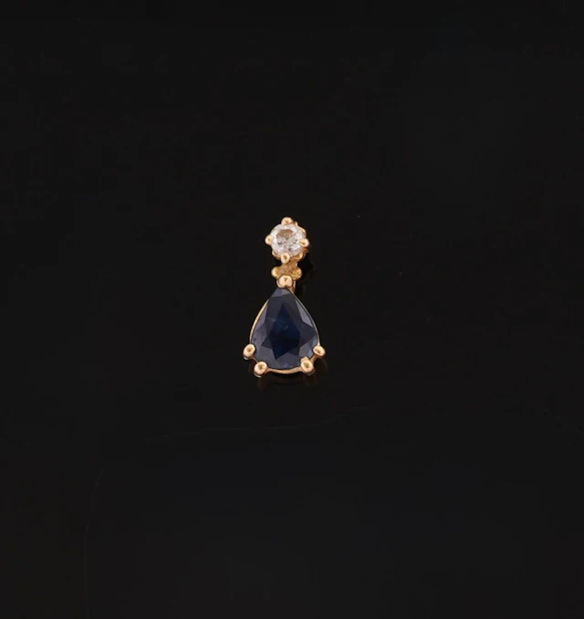 An 18k yellow gold pendant (750 parts per thousand) set with - Lot 94