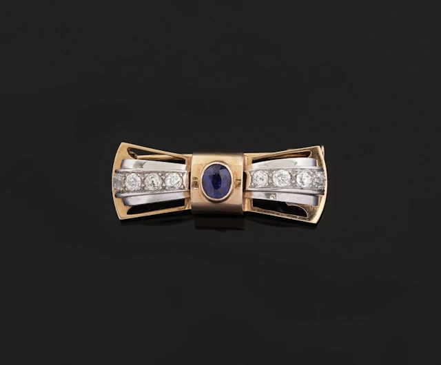 A convertible brooch in 18k yellow gold (750 parts per thous - Lot 156