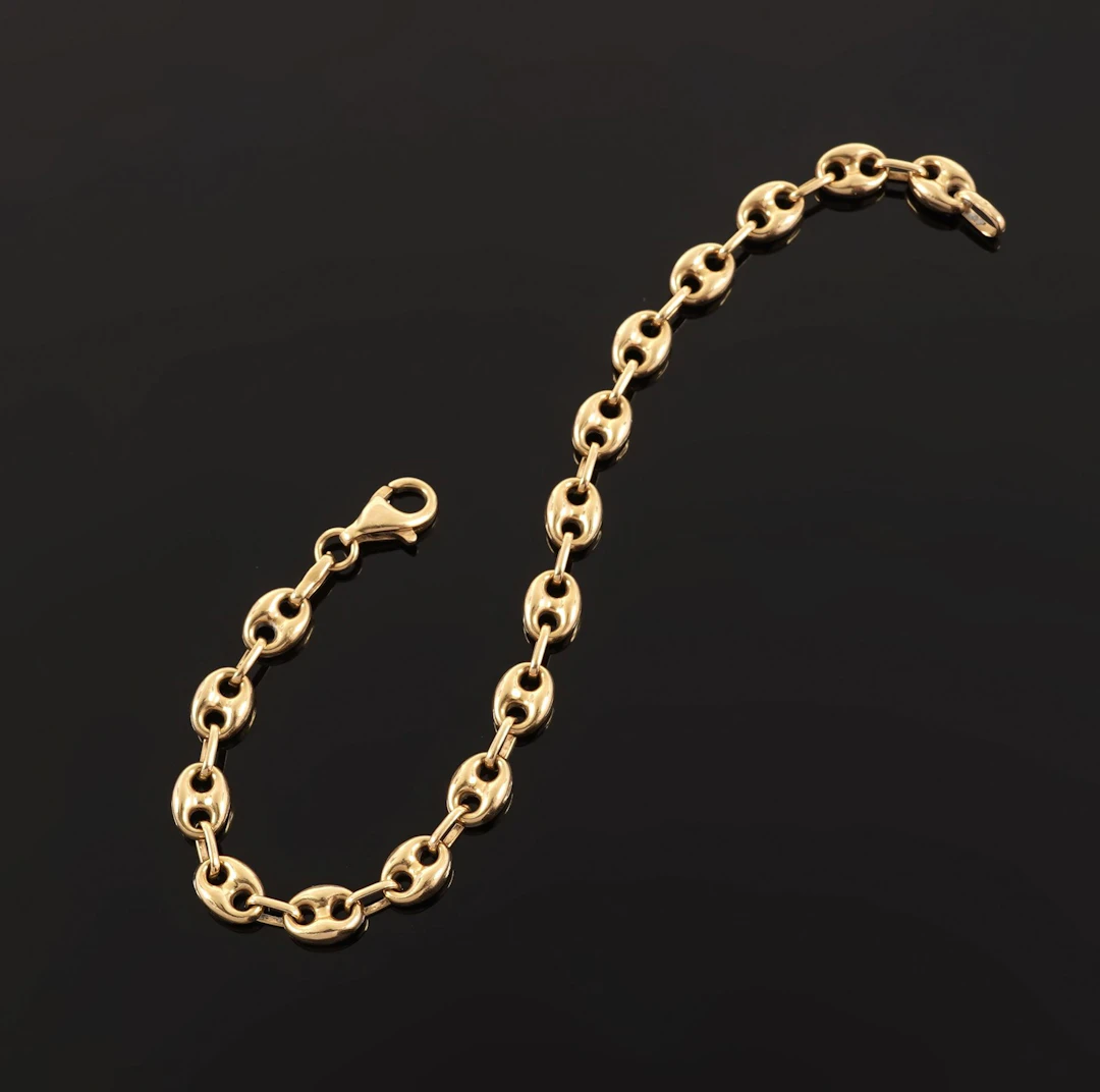 18k yellow gold bracelet (750 parts per thousand) with coffe - Lot 85