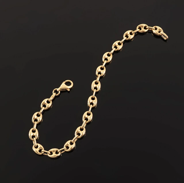 18k yellow gold bracelet (750 parts per thousand) with coffe - Lot 85