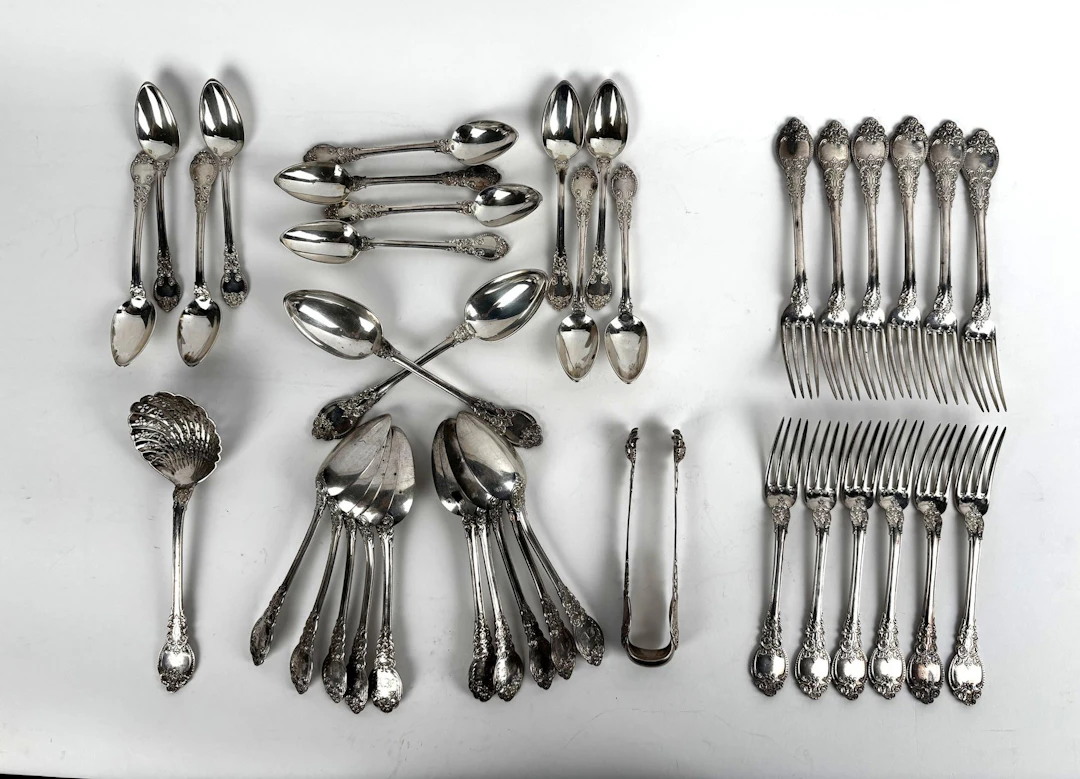A richly ornamented silver tableware set featuring a design - Lot 186