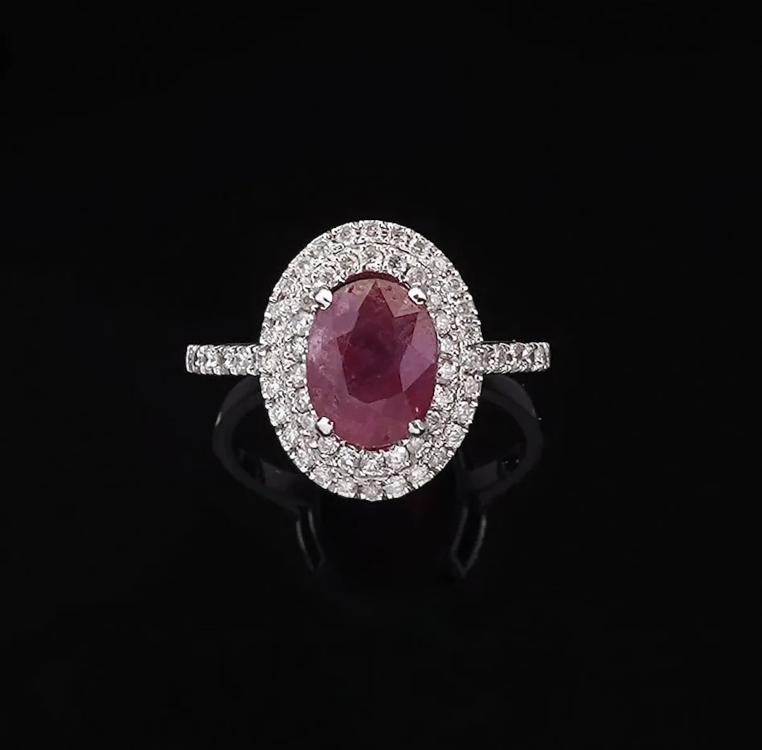 An 18k white gold ring (750 parts per thousand) set with a 2 - Lot 300