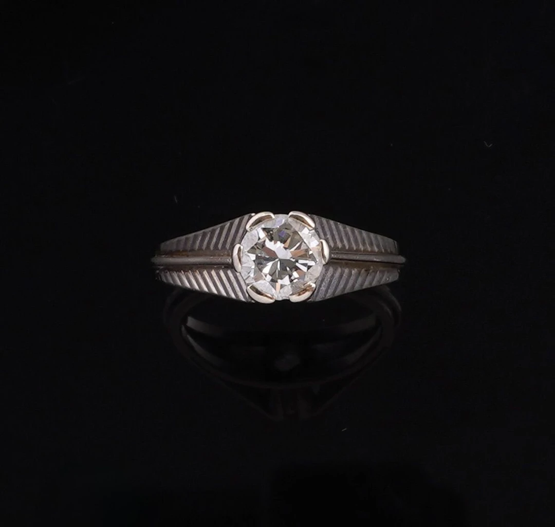 Solitaire, in 18K 750 thousandths white gold, set with a mod - Lot 224