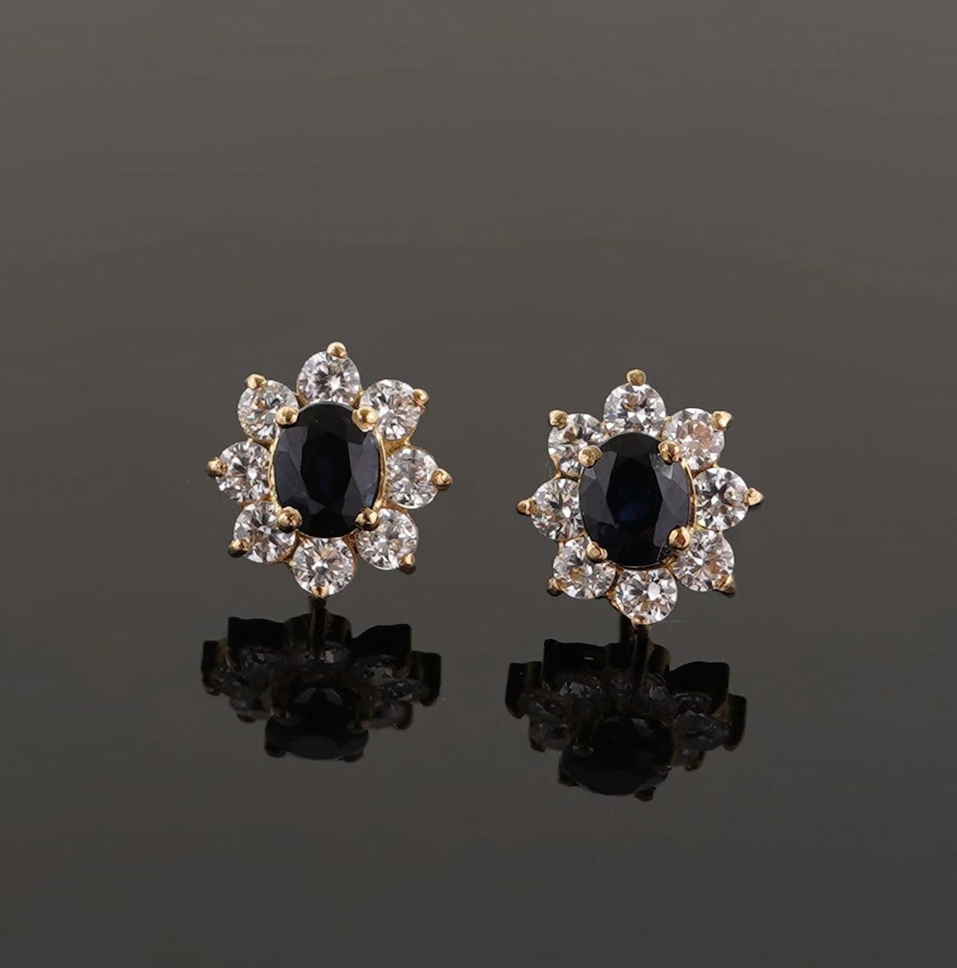 Pair of 18k yellow gold (750) earrings featuring an oval-cut - Lot 211