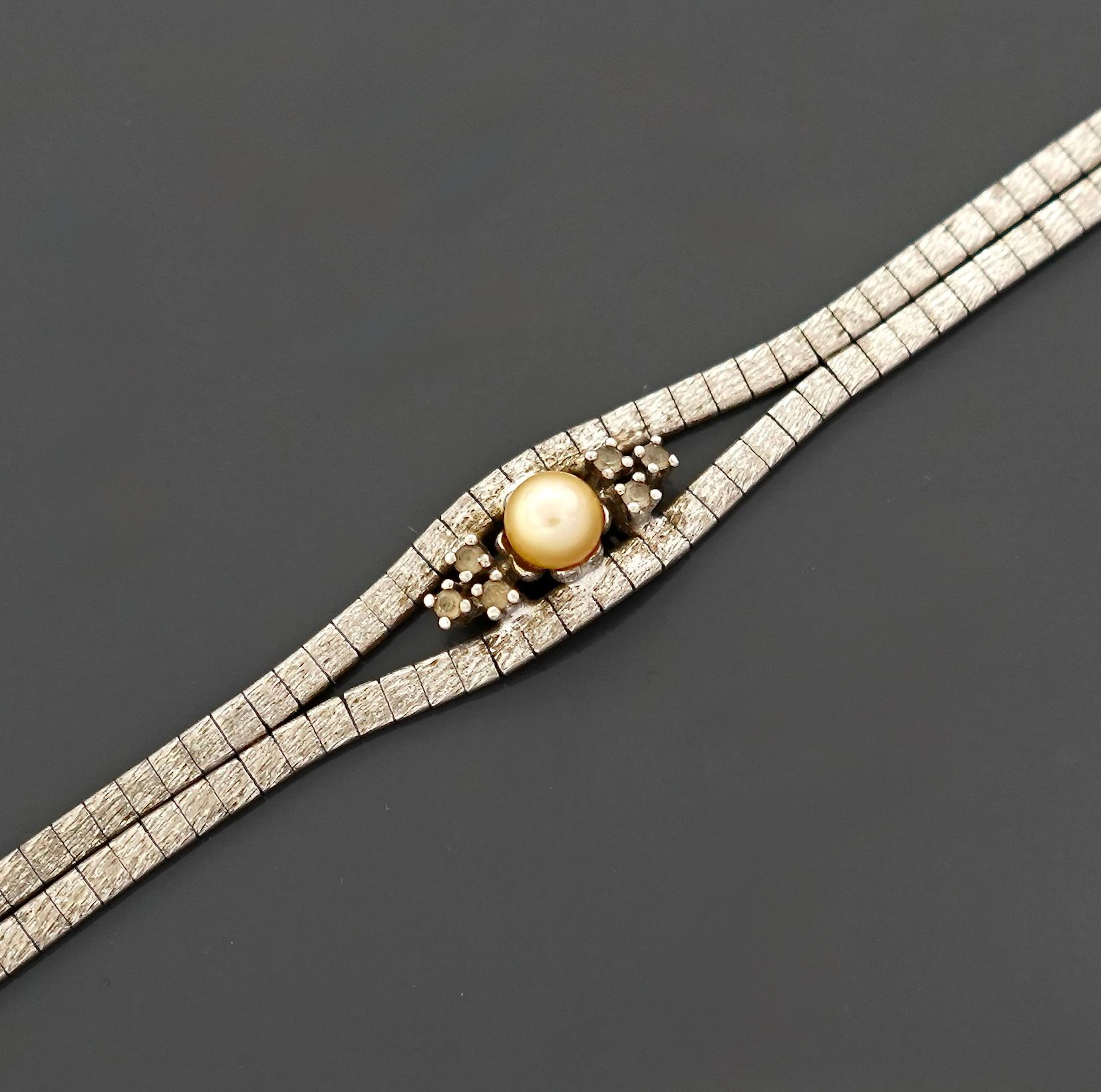 Silver bracelet superior to 800 thousandths with two rows of - Lot 66