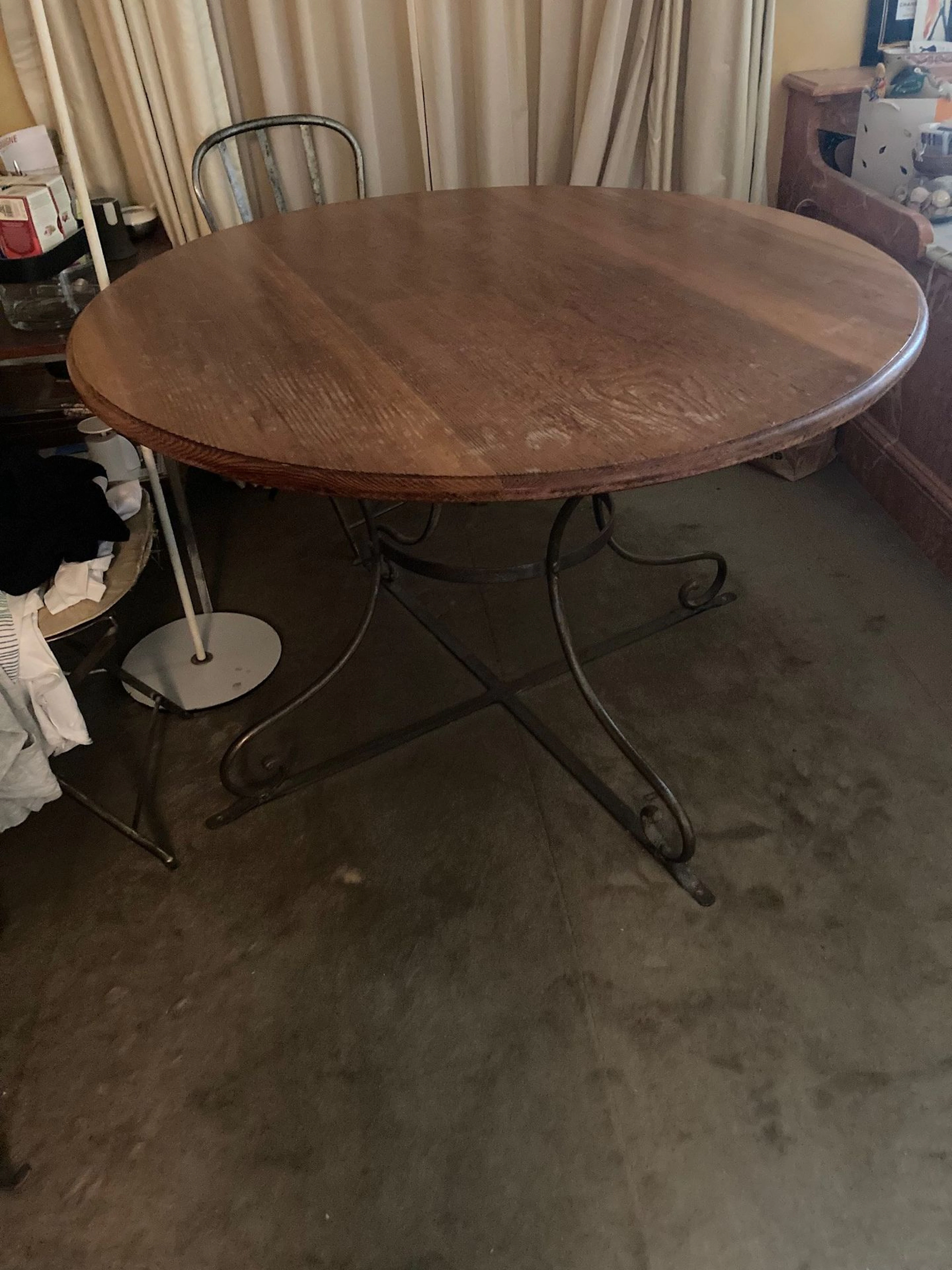 Round table with a beech wood top and wrought-iron base, plu - Lot 416