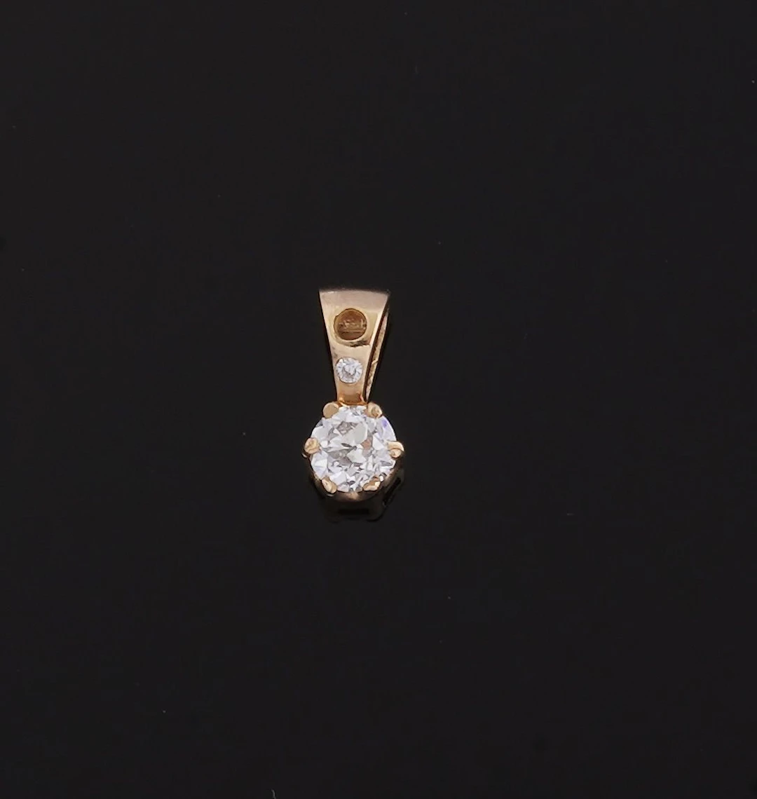 Pendant in 18K yellow gold 750 thousandths set with an old b - Lot 225