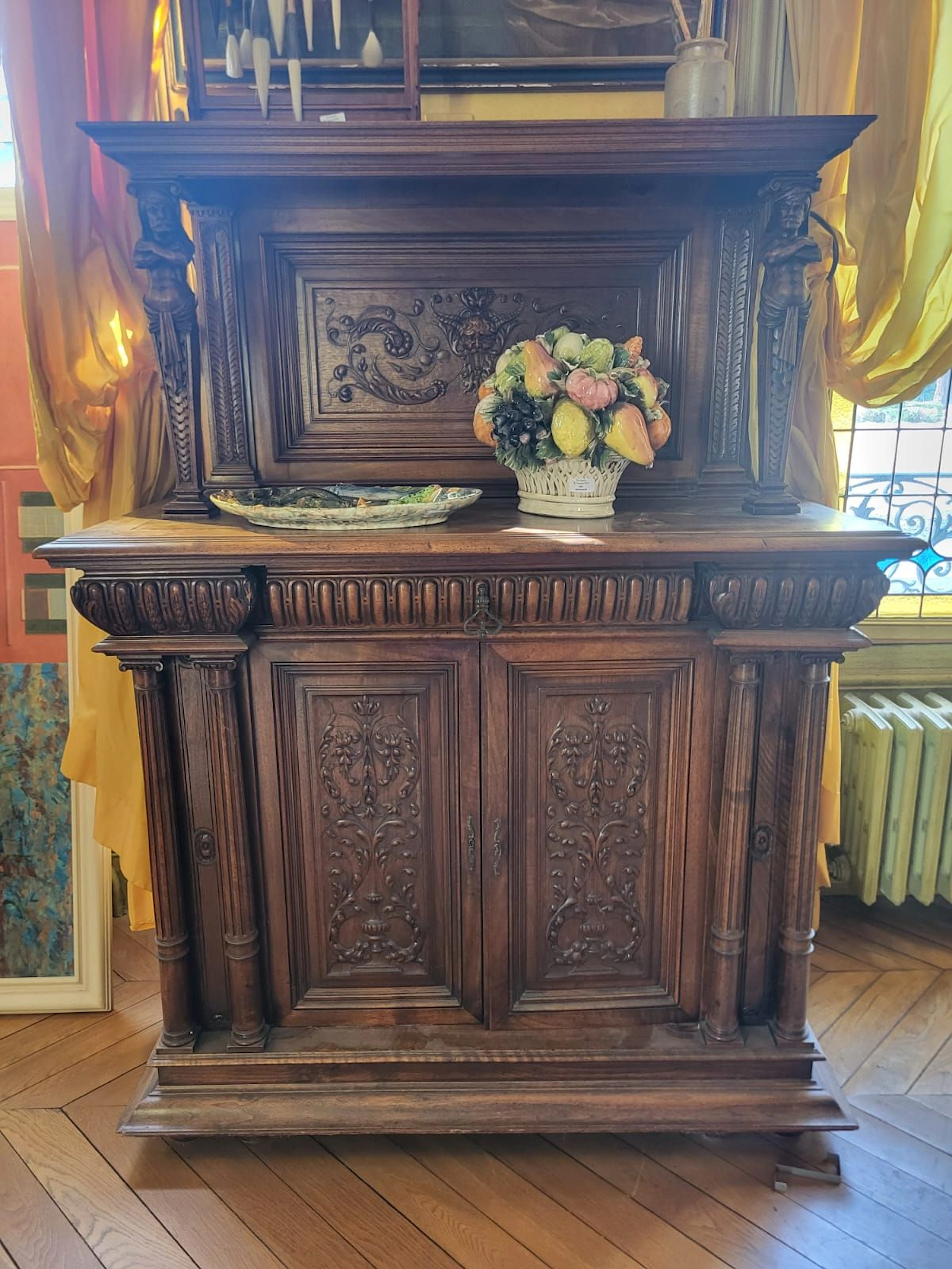 Pair of small, richly carved natural wood sideboards - Lot 628