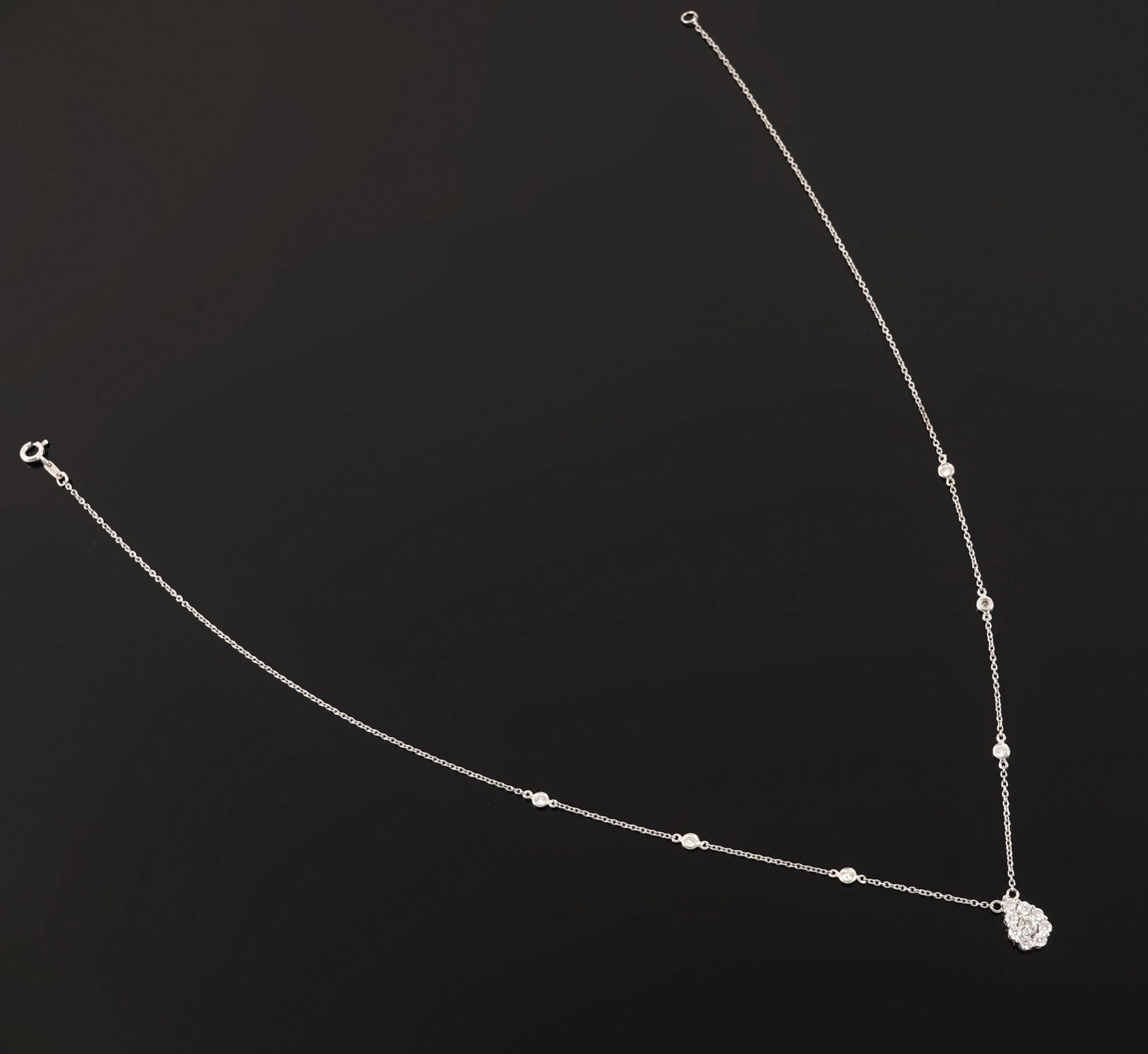 An 18k white gold (750) chain with a forçat link design, fea - Lot 280