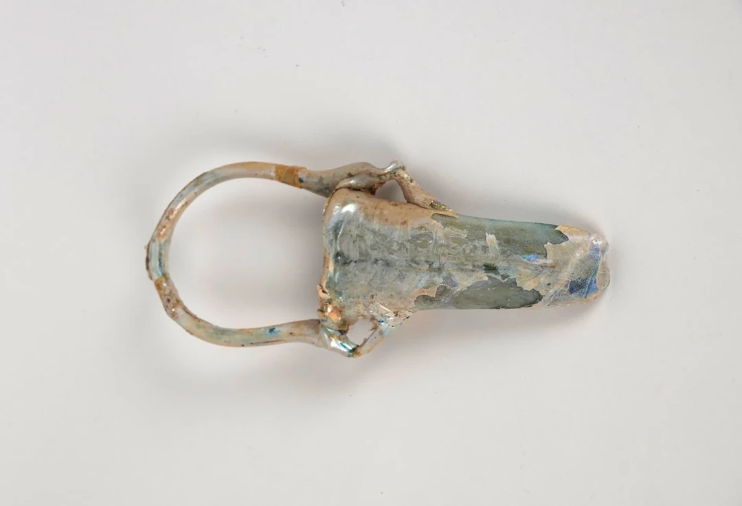 Double balsam bottle with a handle and rings, displaying sig - Lot 225