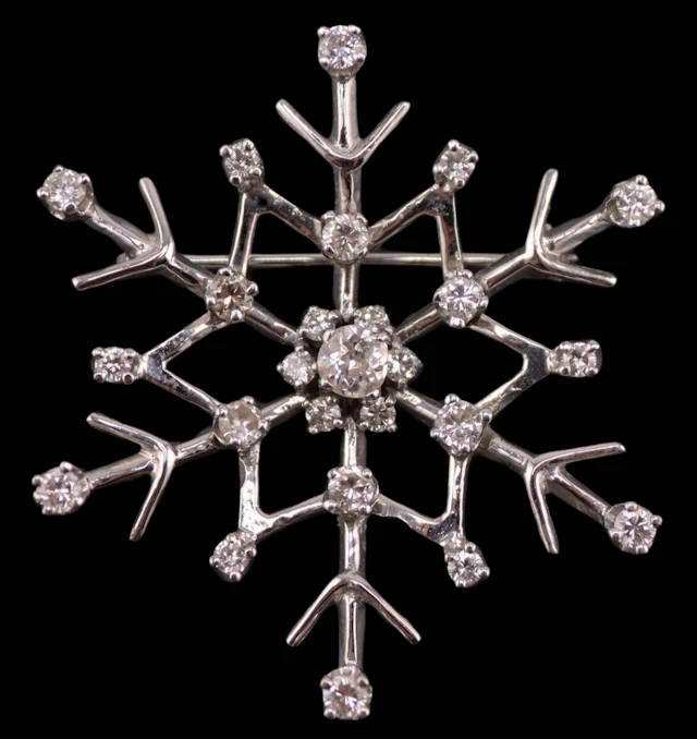 JEWELRY. 12.5kt White Gold and Diamond Snowflake