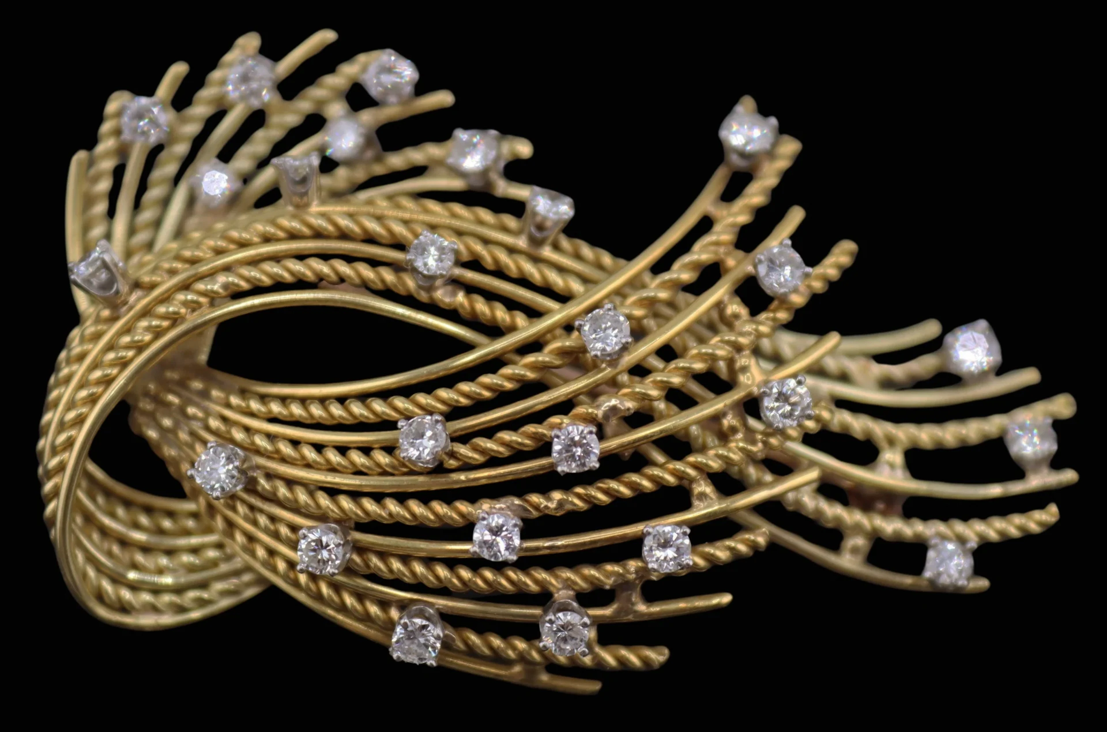 JEWELRY. 17.5kt Gold and Diamond Spray Brooch.