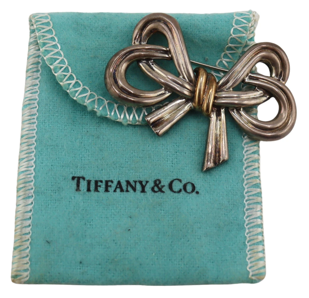JEWELRY. Tiffany & Co. Sterling and 18kt Gold Bow