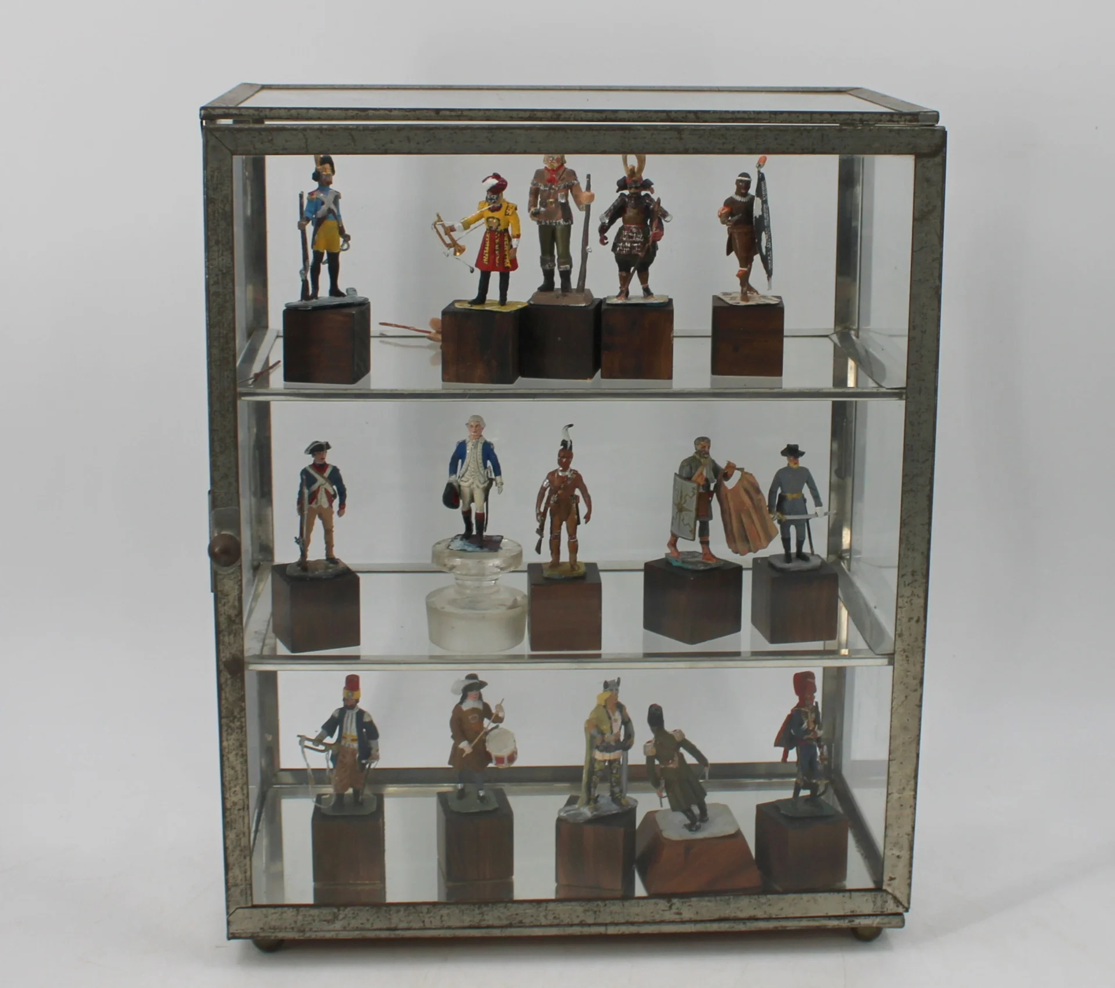 Lot of Assorted Lead Soldiers In Display Case.