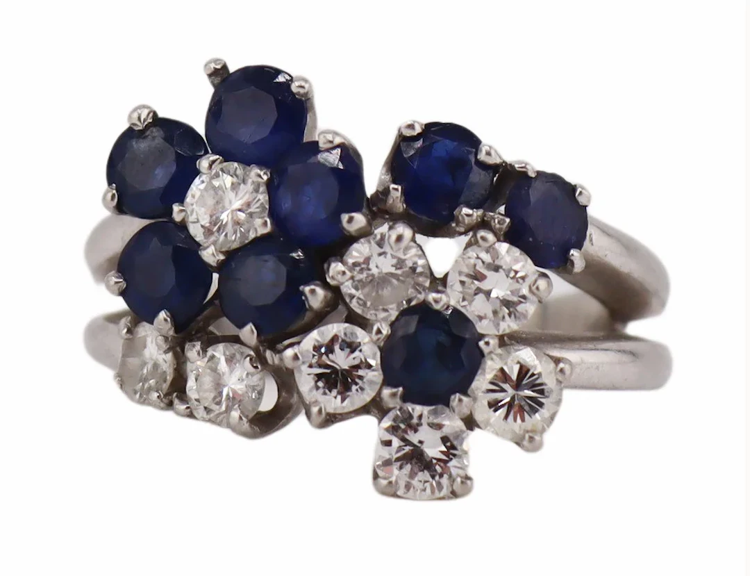 JEWELRY. Platinum Sapphire and Diamond Floral Ring