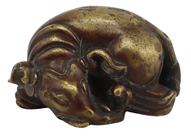 Chinese Gilt Bronze Sleeping Elephant.