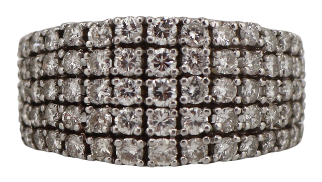 JEWELRY. Platinum and Diamond Tapered Ring.