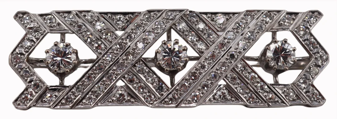 JEWELRY. 17kt Gold and Diamond Brooch.