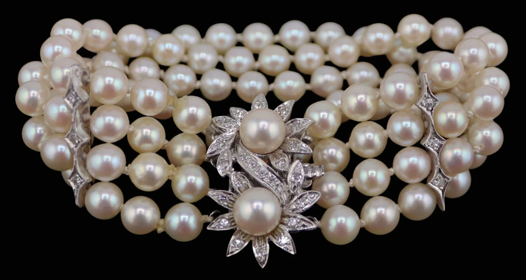 JEWELRY. 13.5kt Gold, Pearl and Diamond Bracelet.
