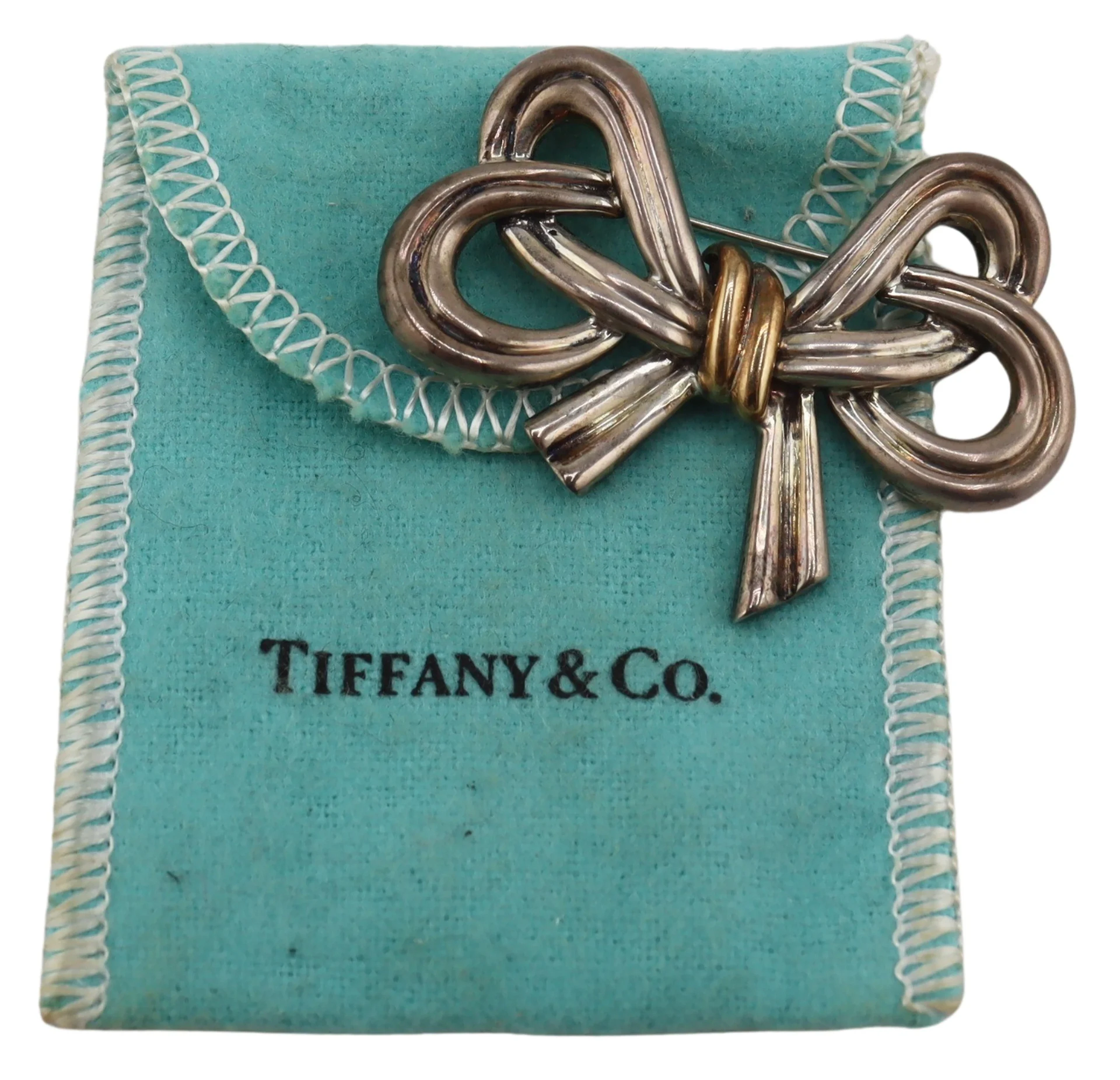 JEWELRY. Tiffany & Co. Sterling and 18kt Gold Bow