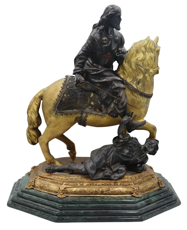 Patinated and Gilt Bronze Figure on Horseback.
