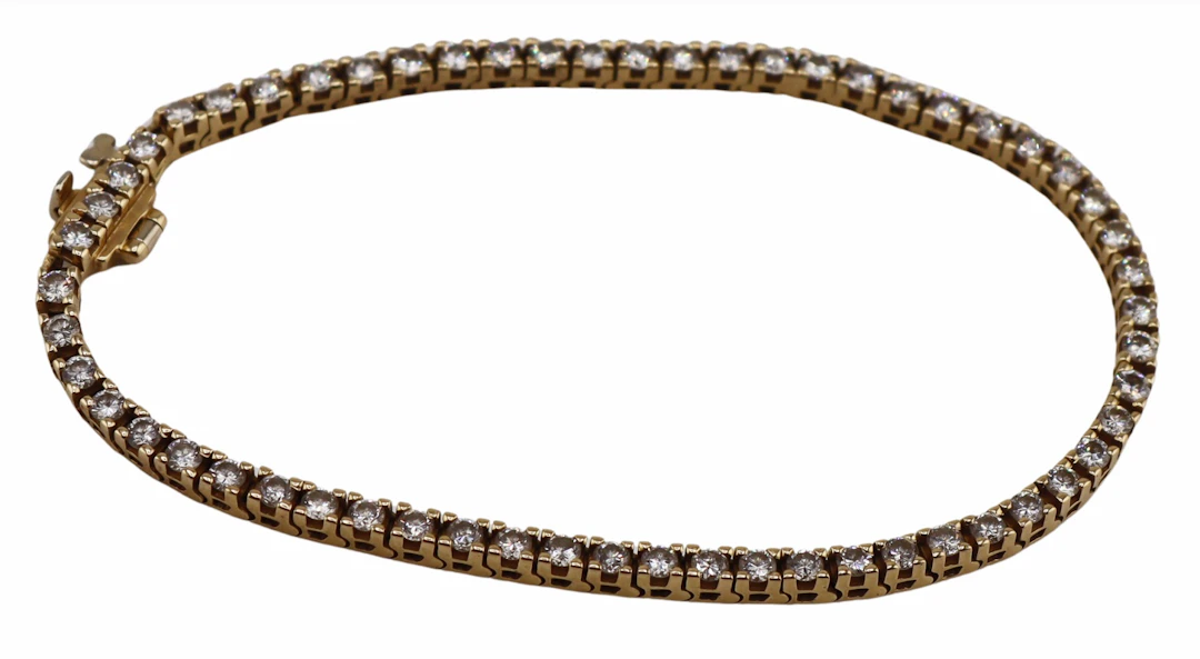 JEWELRY. 14kt Gold and Diamond Line Bracelet.