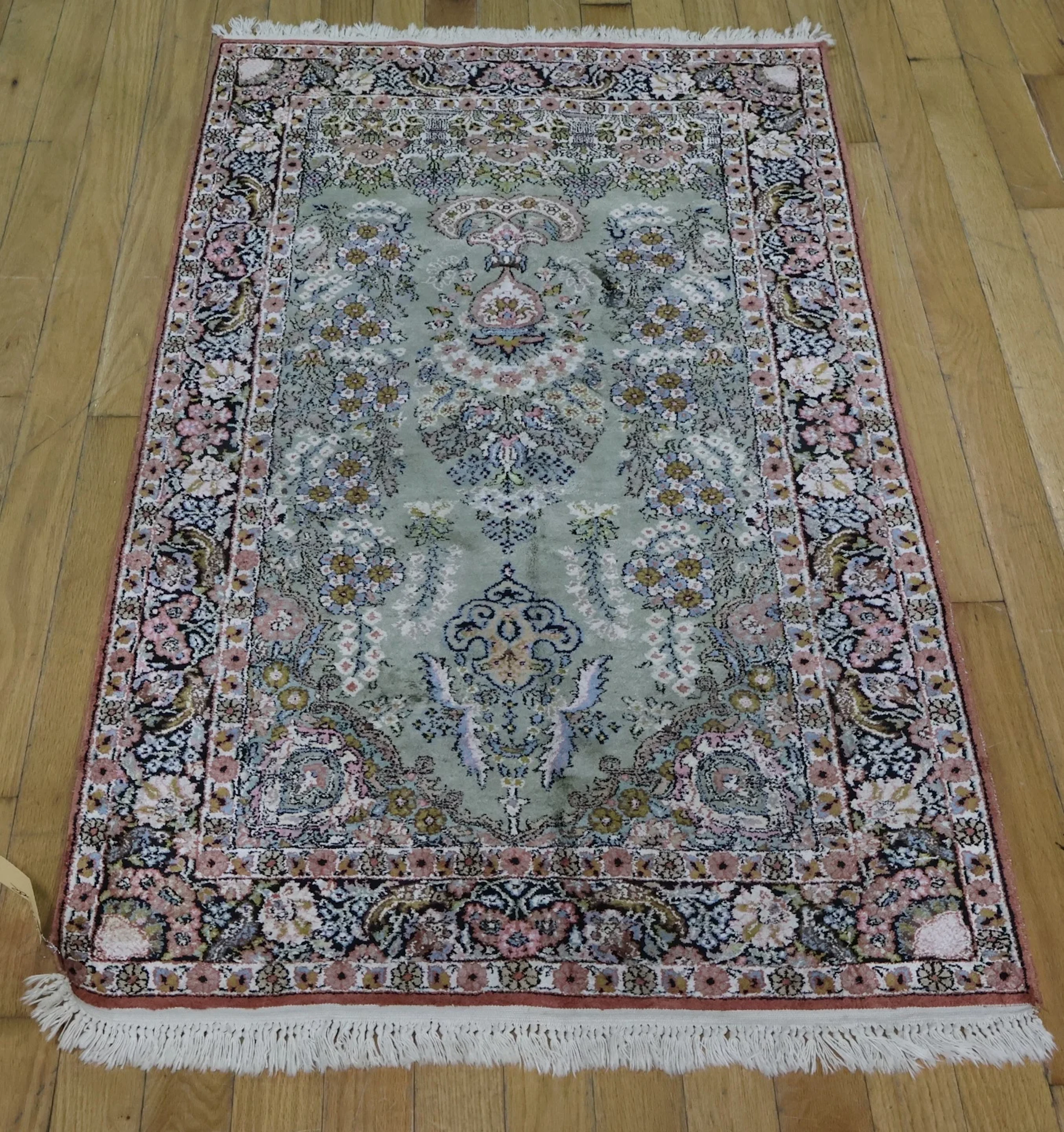 Vintage & Finely Hand Knotted Silk Carpet .