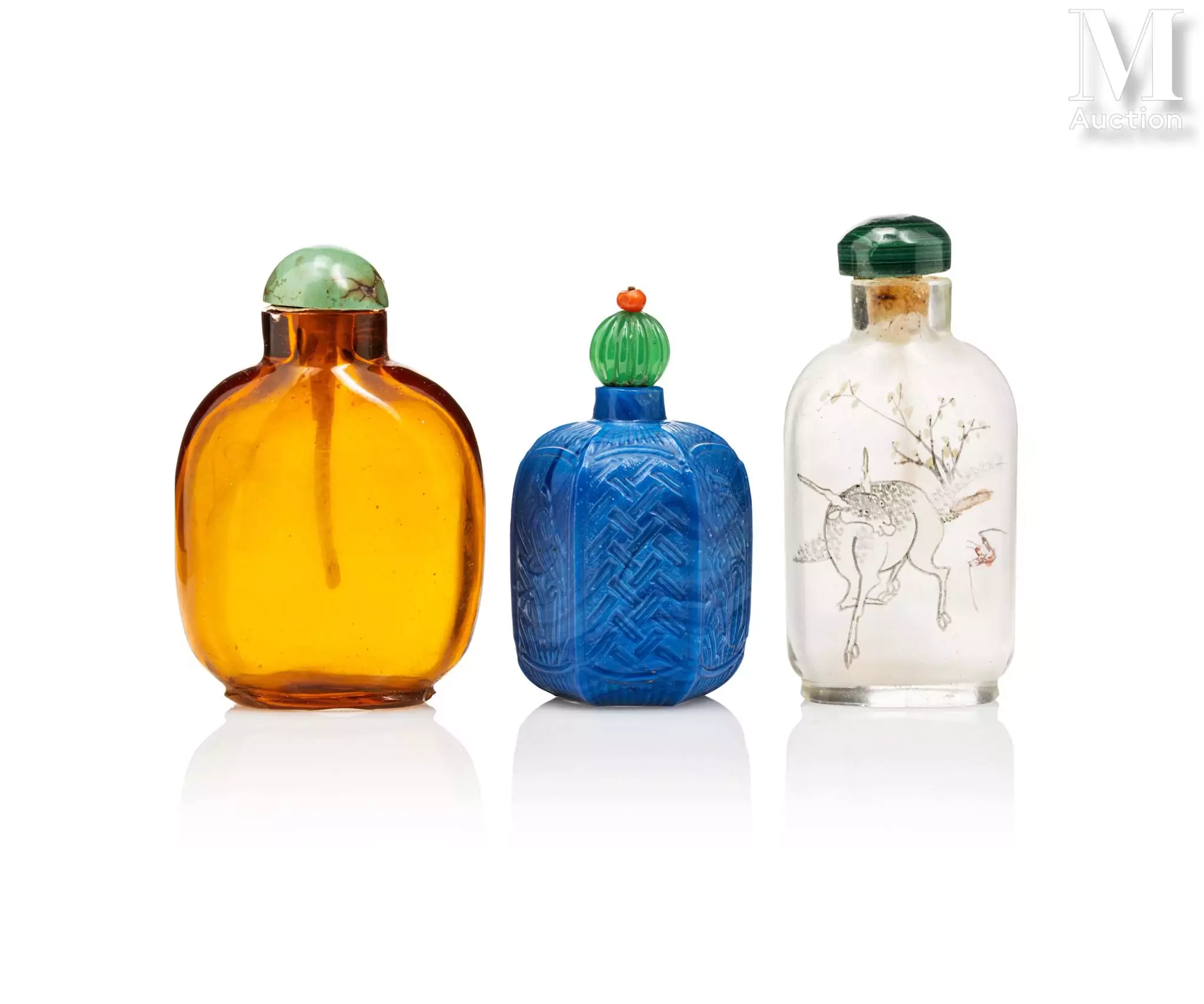 CHINE, XIX - XXe siècle Ensemble de trois tabatières en verre